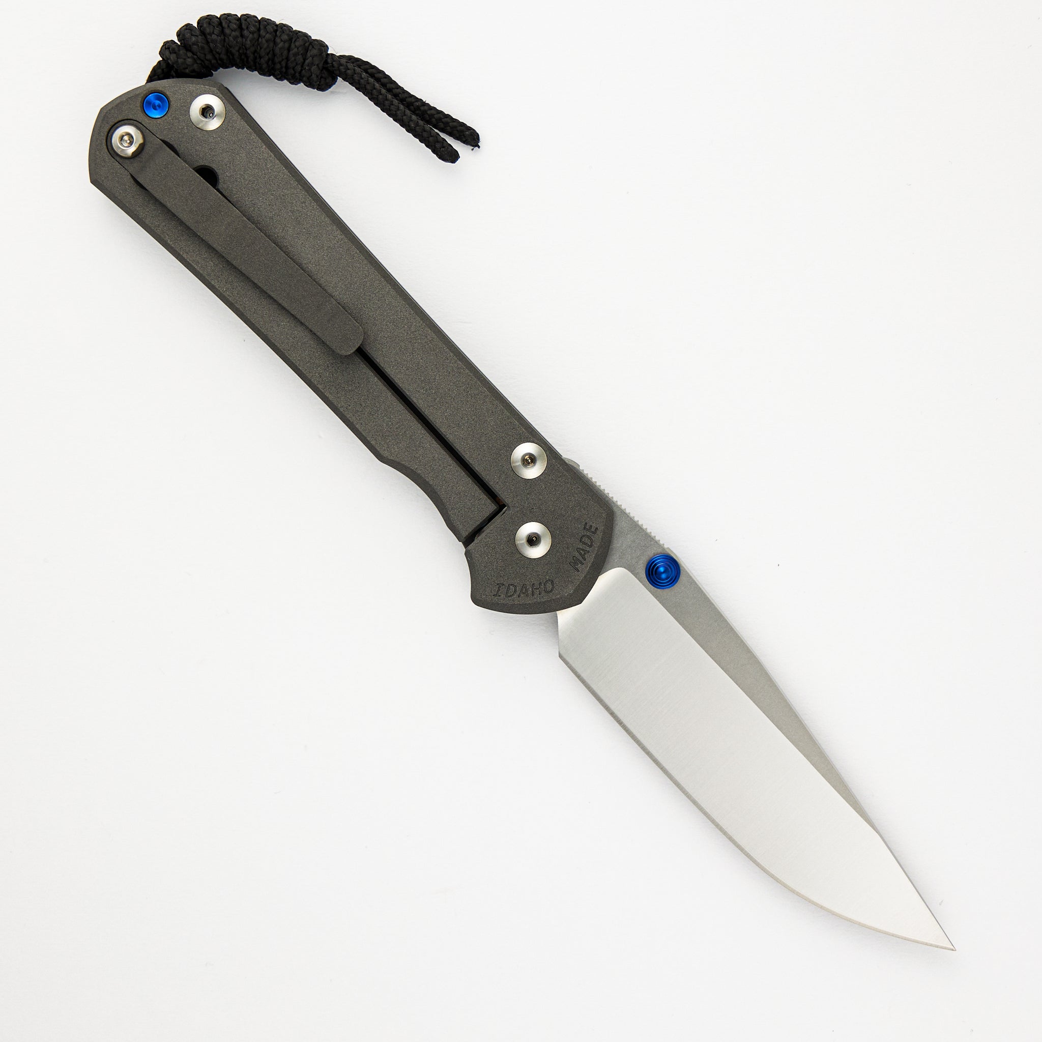 LARGE SEBENZA 31 – POLISHED CPM MAGNACUT BLADE – BLUE DOUBLE THUMB LUGS