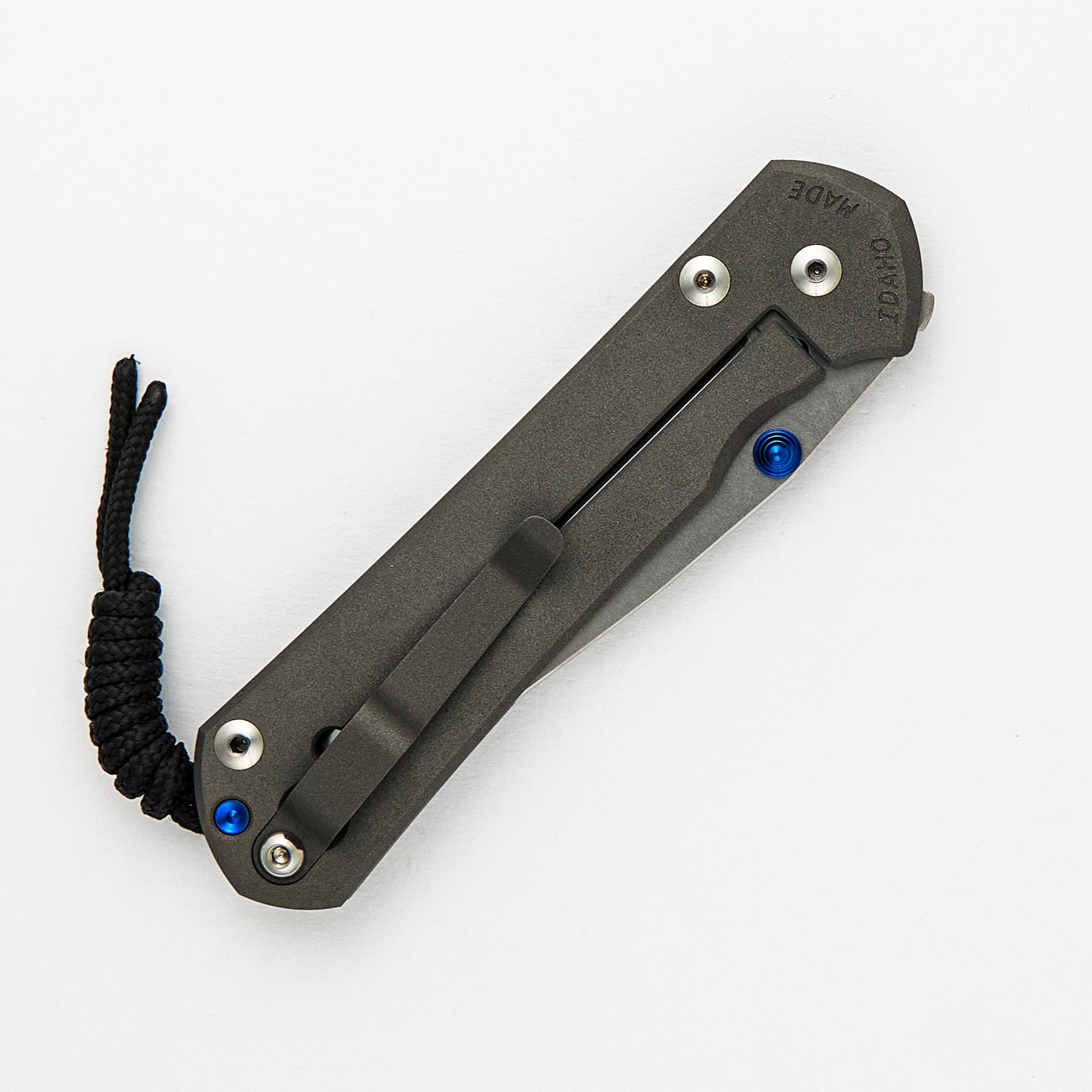 LARGE SEBENZA 31 – POLISHED CPM MAGNACUT BLADE – BLUE DOUBLE THUMB LUGS