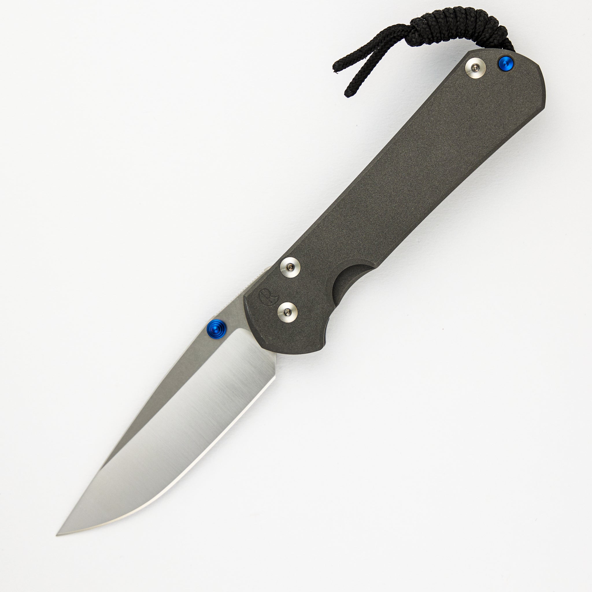 LARGE SEBENZA 31 – POLISHED CPM MAGNACUT BLADE – BLUE DOUBLE THUMB LUGS