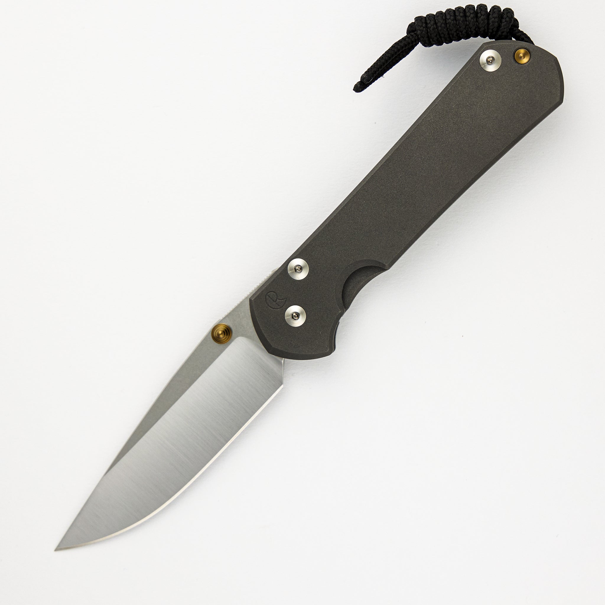 LARGE SEBENZA 31 – POLISHED CPM MAGNACUT BLADE – GOLD DOUBLE THUMB LUGS