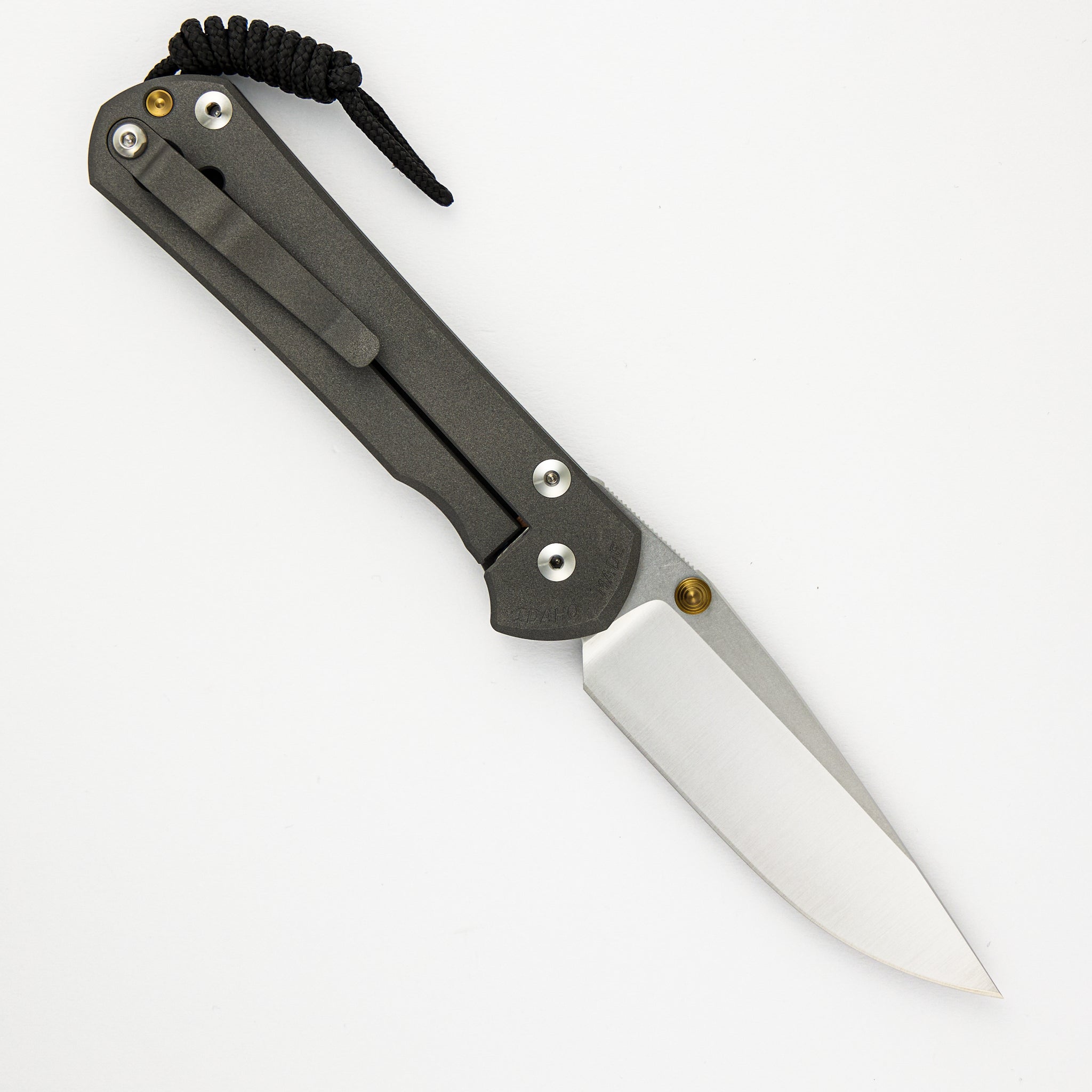 LARGE SEBENZA 31 – POLISHED CPM MAGNACUT BLADE – GOLD DOUBLE THUMB LUGS