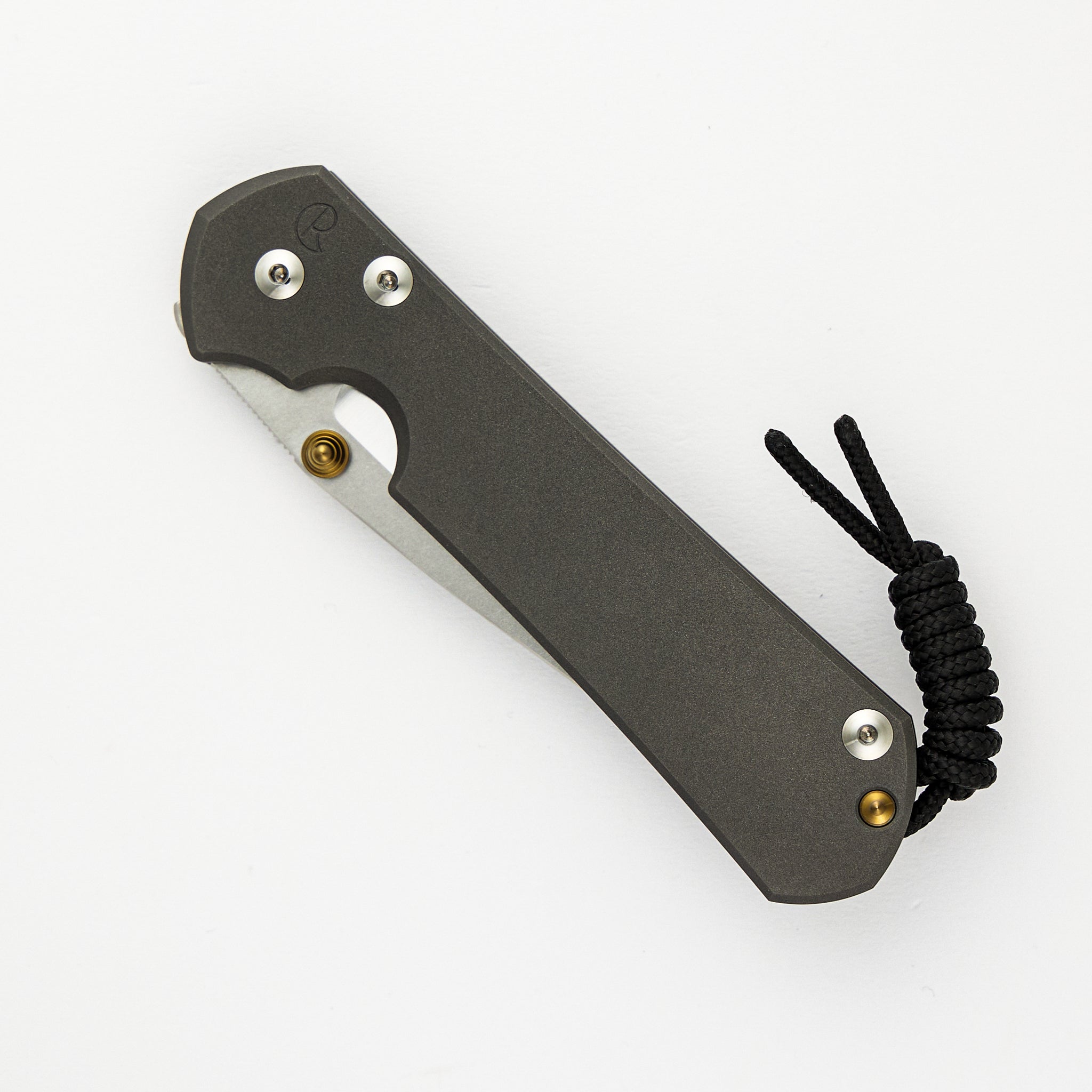 LARGE SEBENZA 31 – POLISHED CPM MAGNACUT BLADE – GOLD DOUBLE THUMB LUGS
