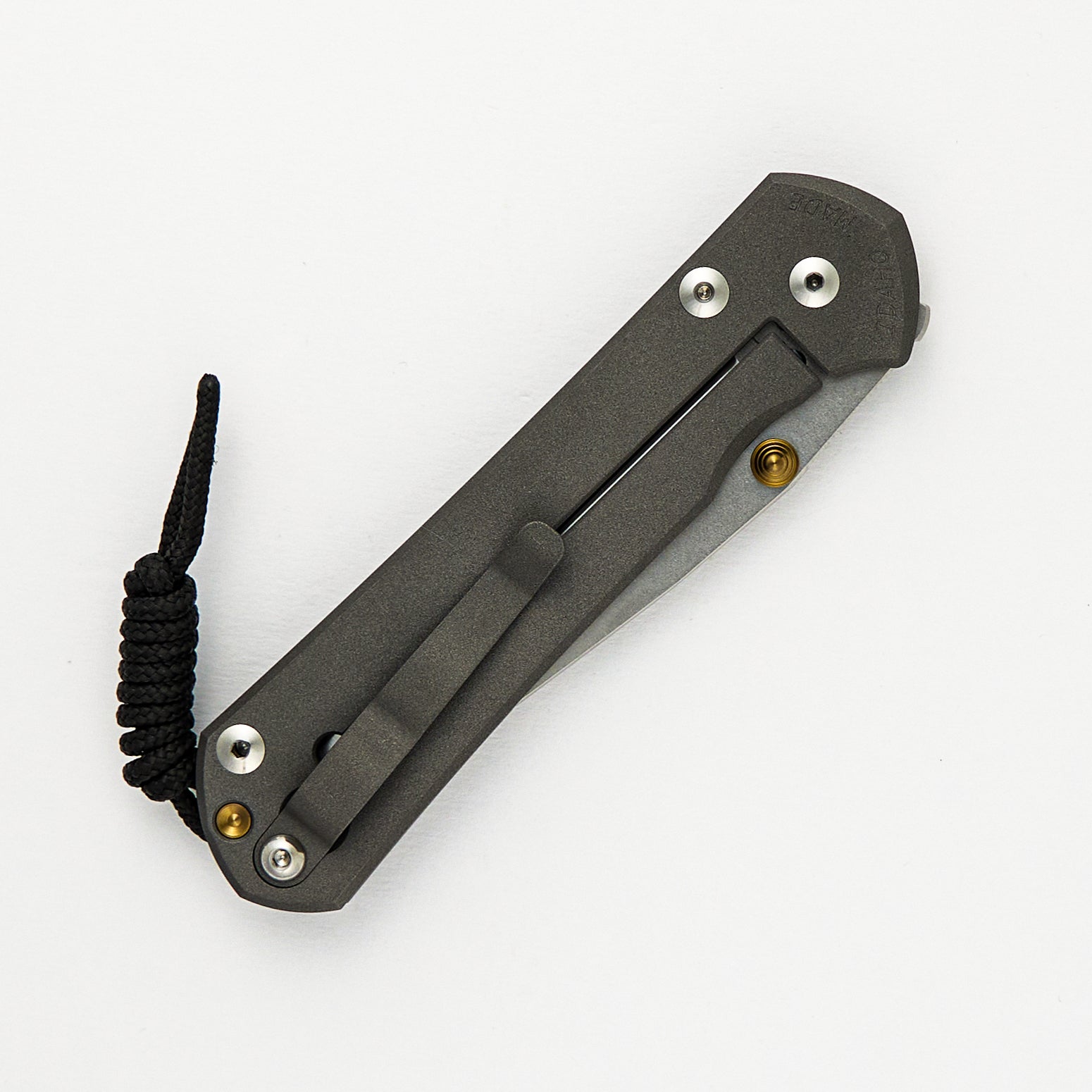 LARGE SEBENZA 31 – POLISHED CPM MAGNACUT BLADE – GOLD DOUBLE THUMB LUGS