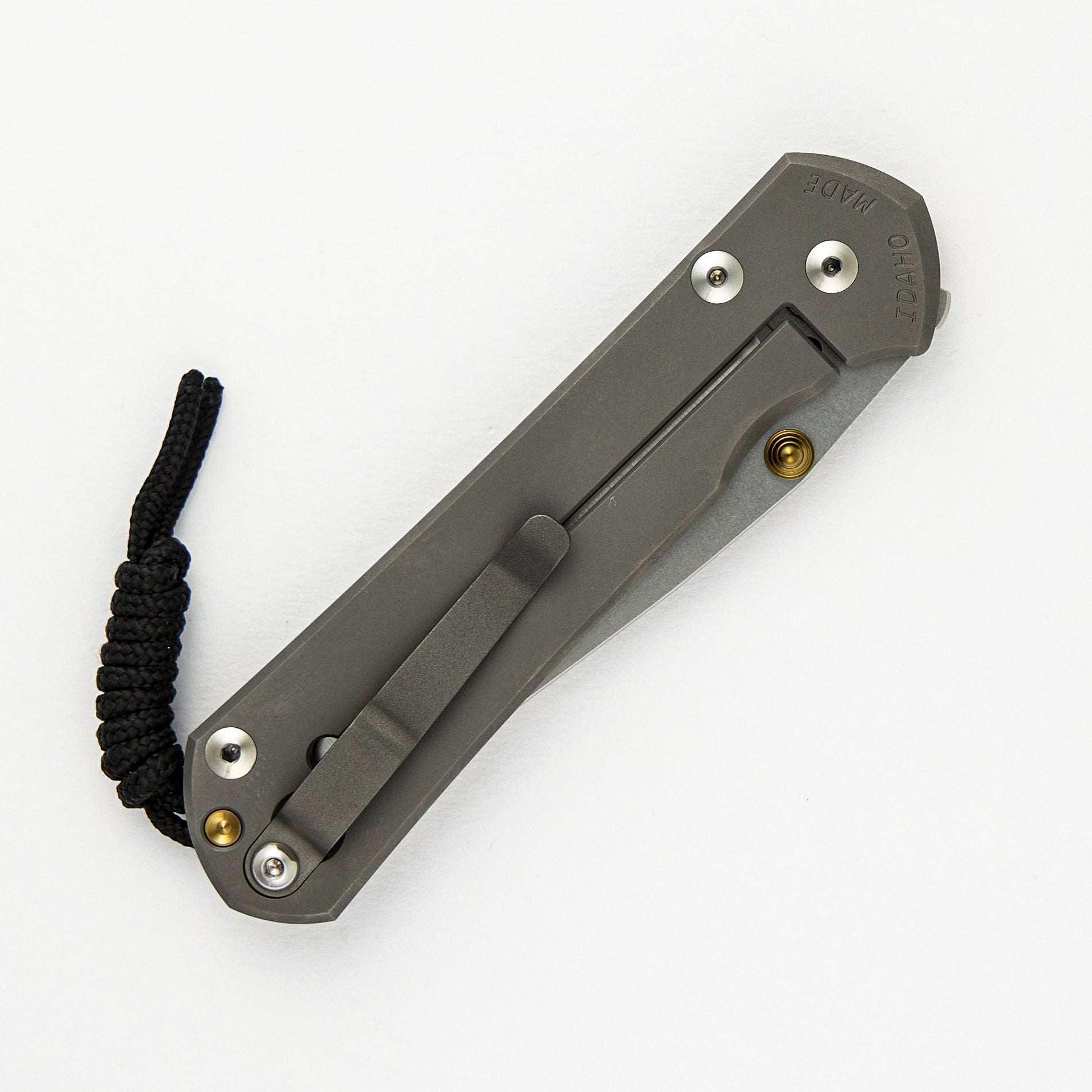 LARGE SEBENZA 31 – GLASS BLASTED – POLISHED CPM MAGNACUT BLADE – GOLD DOUBLE THUMB LUGS