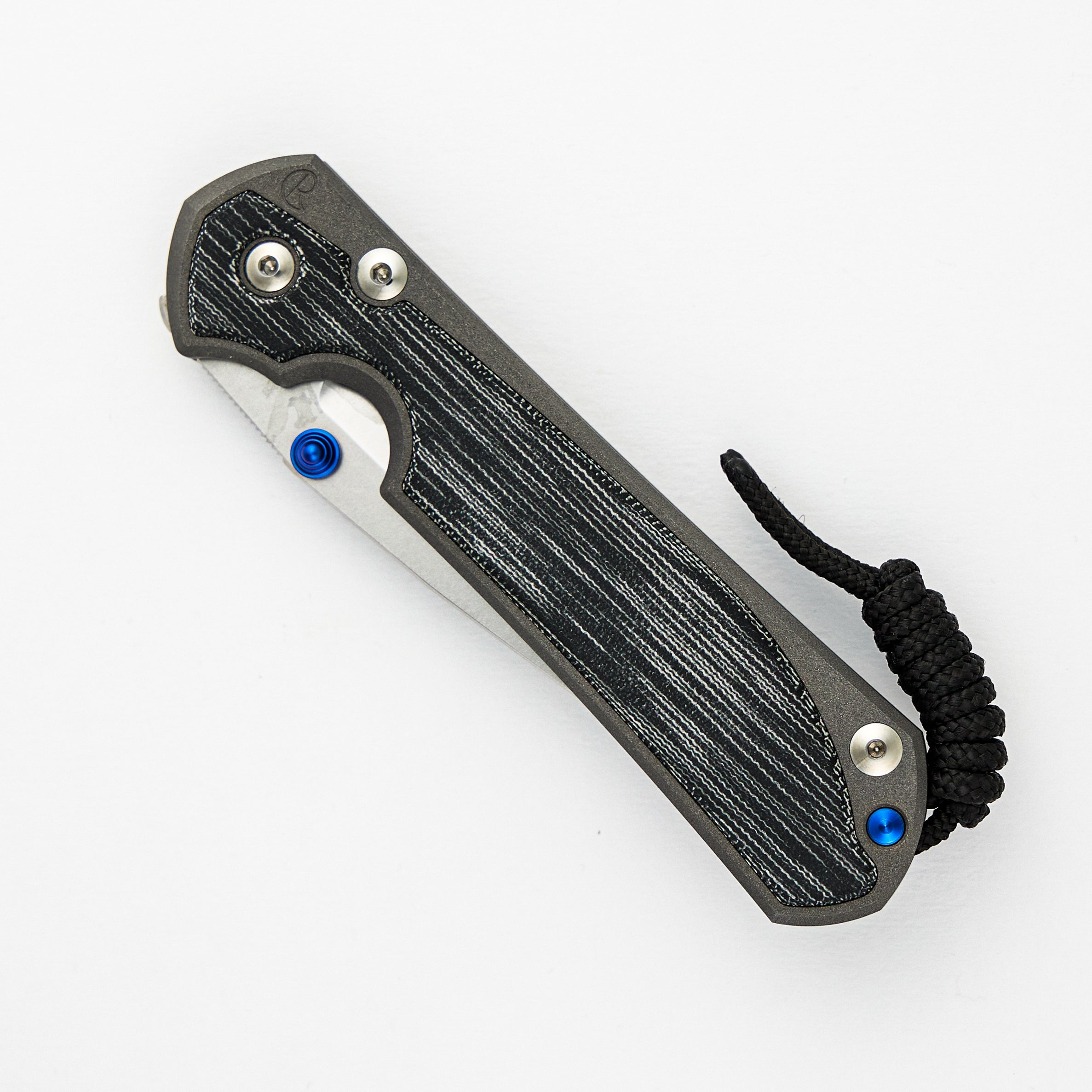 LARGE SEBENZA 31 BLACK CANVAS MICARTA INLAY – CPM MAGNACUT BLADE – BLUE DOUBLE THUMB LUGS