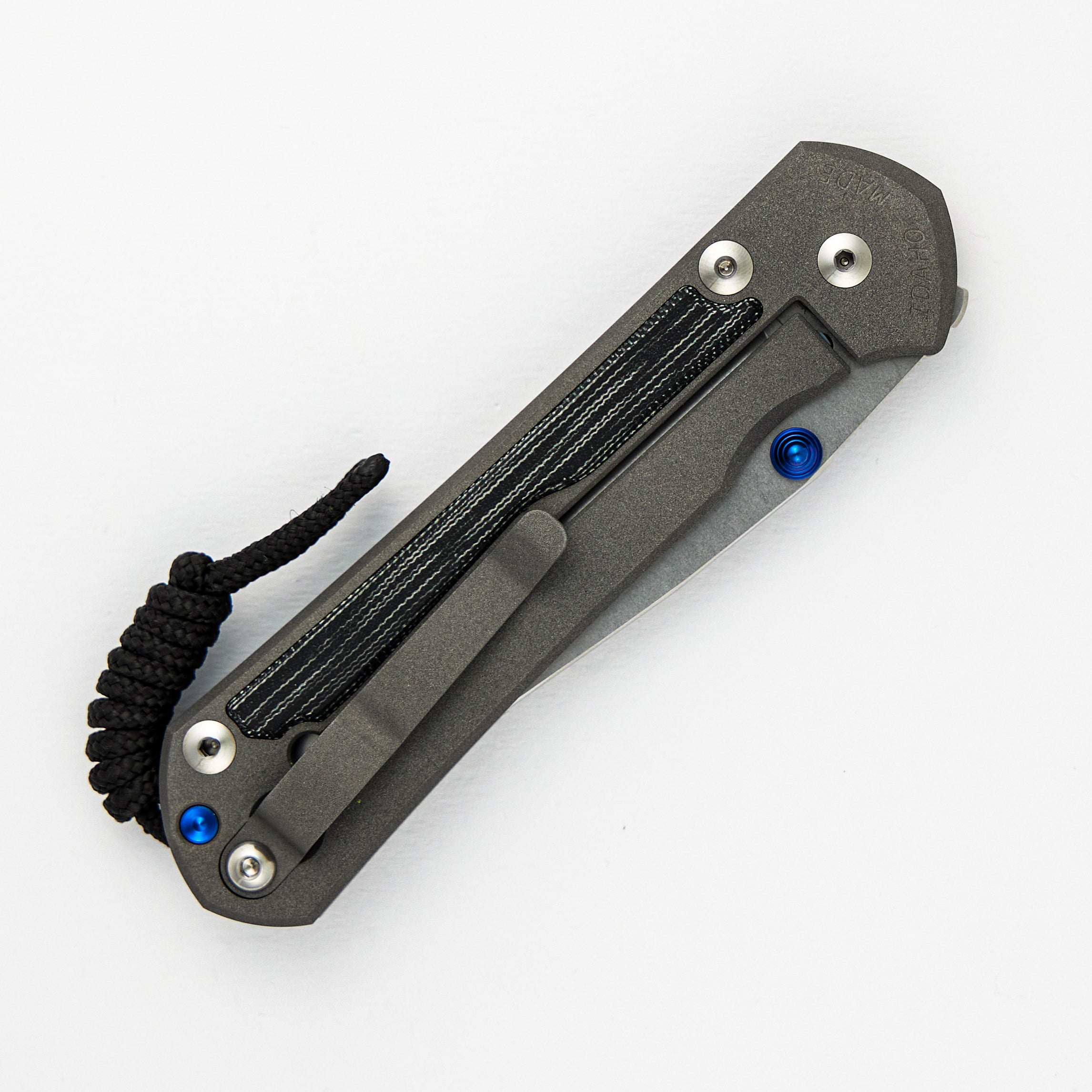 LARGE SEBENZA 31 BLACK CANVAS MICARTA INLAY – CPM MAGNACUT BLADE – BLUE DOUBLE THUMB LUGS
