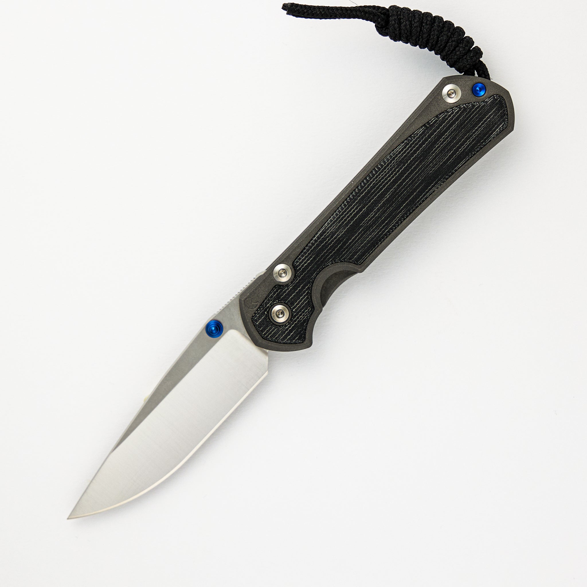 LARGE SEBENZA 31 BLACK CANVAS MICARTA INLAY – POLISHED CPM MAGNACUT BLADE – BLUE DOUBLE THUMB LUGS
