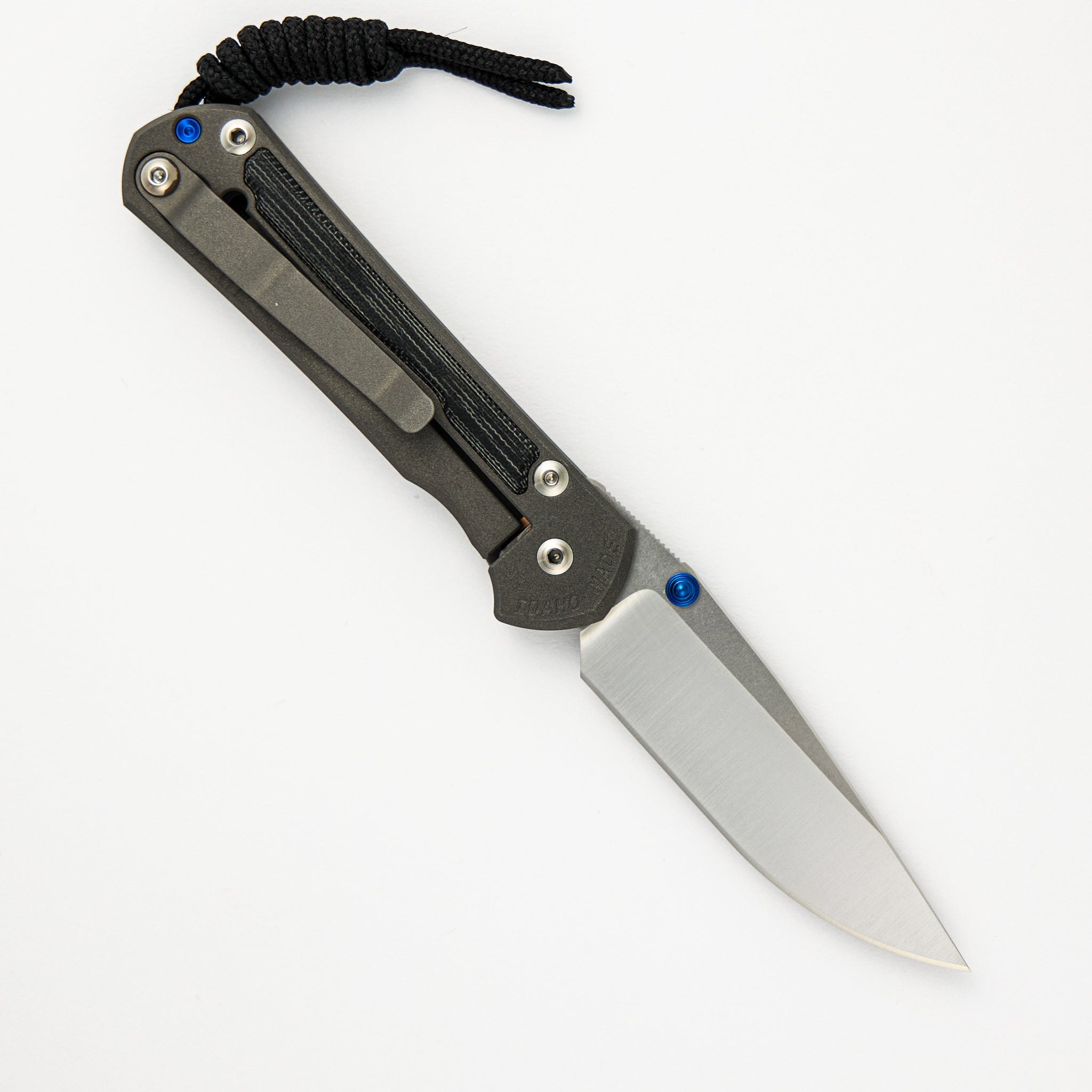 LARGE SEBENZA 31 BLACK CANVAS MICARTA INLAY – POLISHED CPM MAGNACUT BLADE – BLUE DOUBLE THUMB LUGS