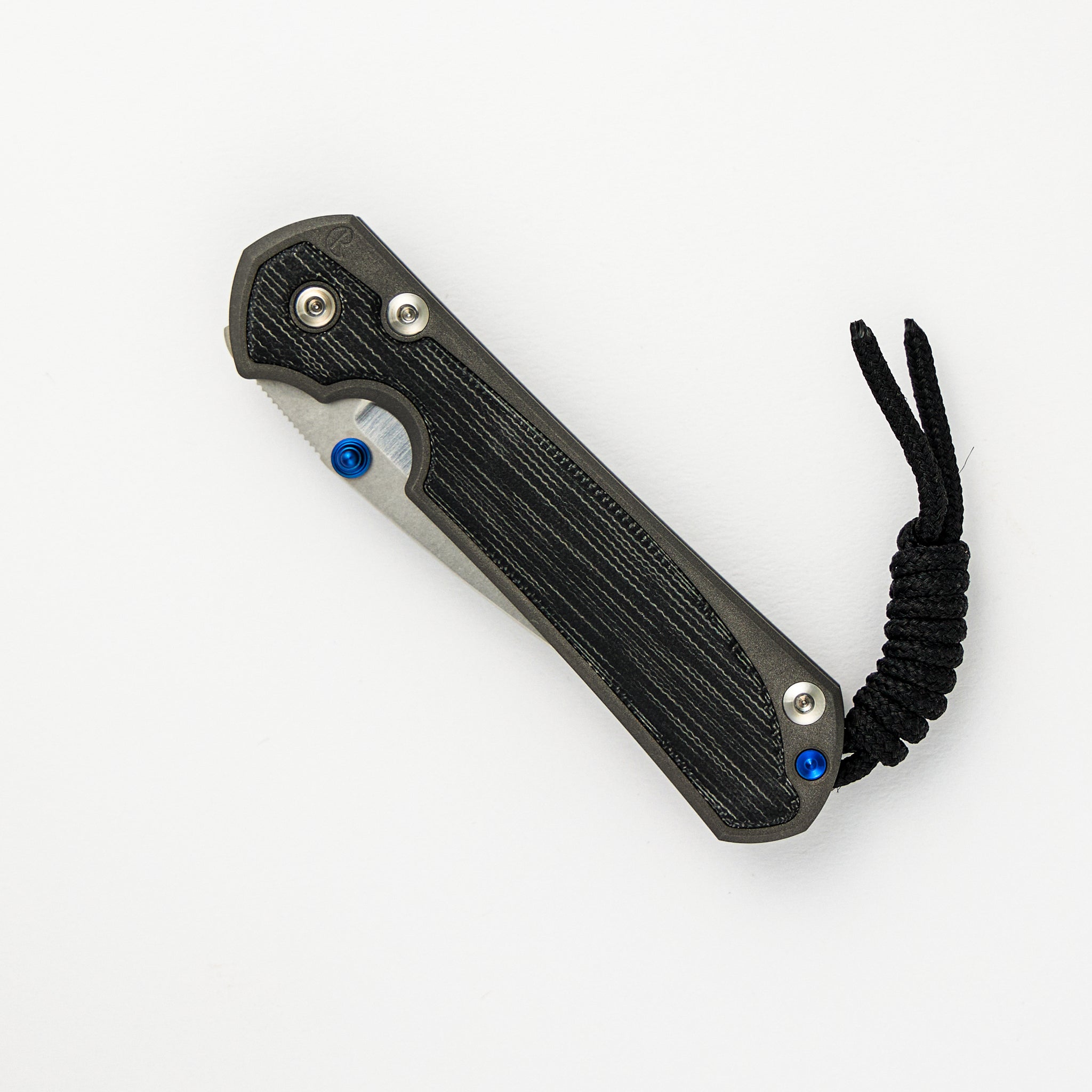 LARGE SEBENZA 31 BLACK CANVAS MICARTA INLAY – POLISHED CPM MAGNACUT BLADE – BLUE DOUBLE THUMB LUGS