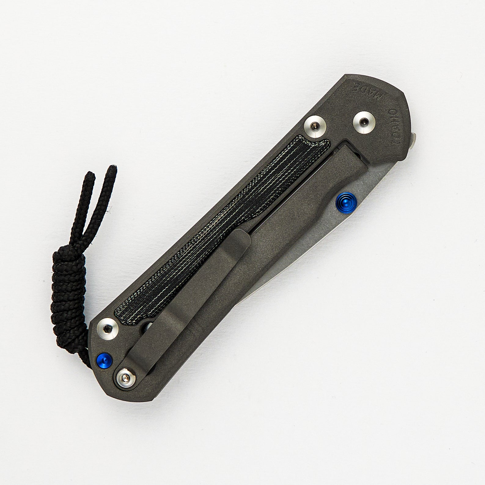 LARGE SEBENZA 31 BLACK CANVAS MICARTA INLAY – POLISHED CPM MAGNACUT BLADE – BLUE DOUBLE THUMB LUGS