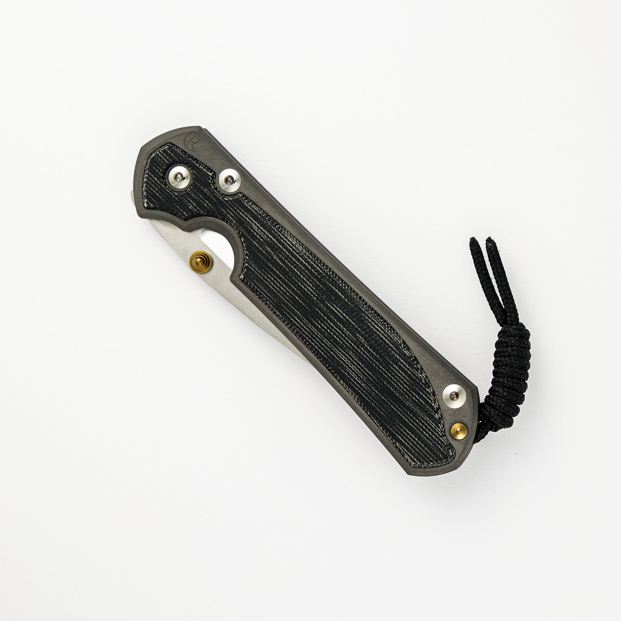 LARGE SEBENZA 31 BLACK CANVAS MICARTA INLAY – POLISHED CPM MAGNACUT BLADE – GOLD DOUBLE THUMB LUGS