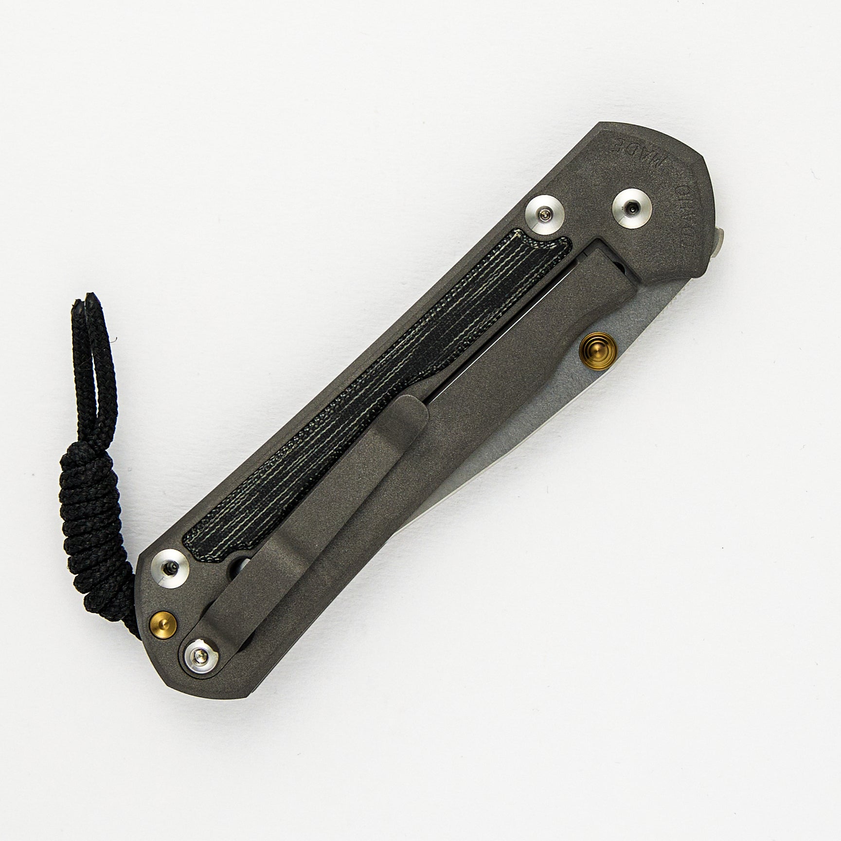 LARGE SEBENZA 31 BLACK CANVAS MICARTA INLAY – POLISHED CPM MAGNACUT BLADE – GOLD DOUBLE THUMB LUGS