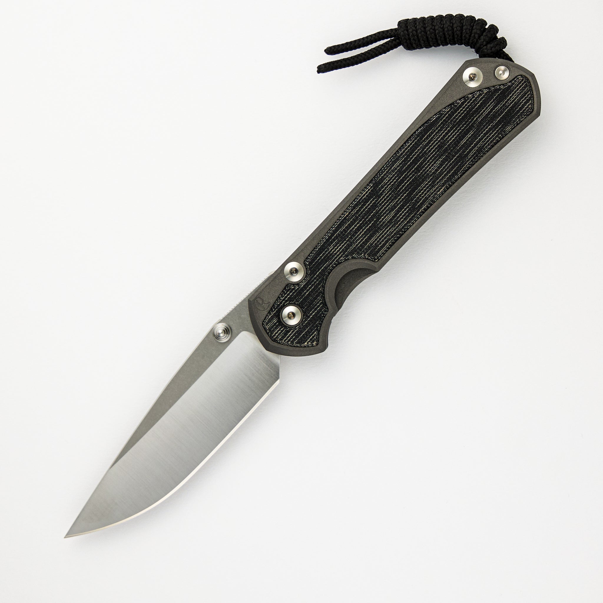 LARGE SEBENZA 31 BLACK CANVAS MICARTA INLAY – POLISHED CPM MAGNACUT BLADE – SILVER DOUBLE THUMB LUGS