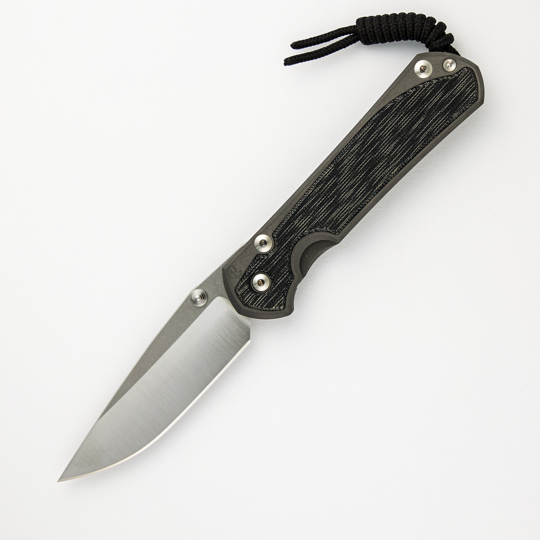 CHRIS REEVE LARGE SEBENZA 31 BLACK CANVAS MICARTA INLAY – POLISHED CPM MAGNACUT BLADE – SILVER DOUBLE THUMB LUGS