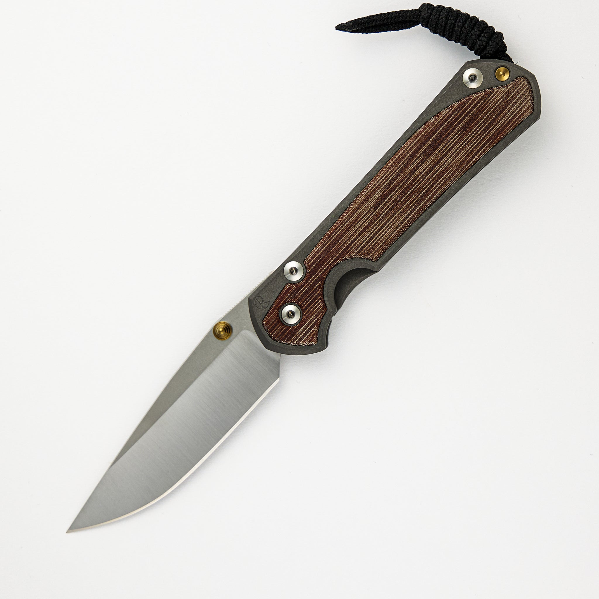 CHRIS REEVE LARGE SEBENZA 31 NATURAL CANVAS MICARTA INLAY – POLISHED CPM MAGNACUT BLADE – GOLD DOUBLE THUMB LUGS