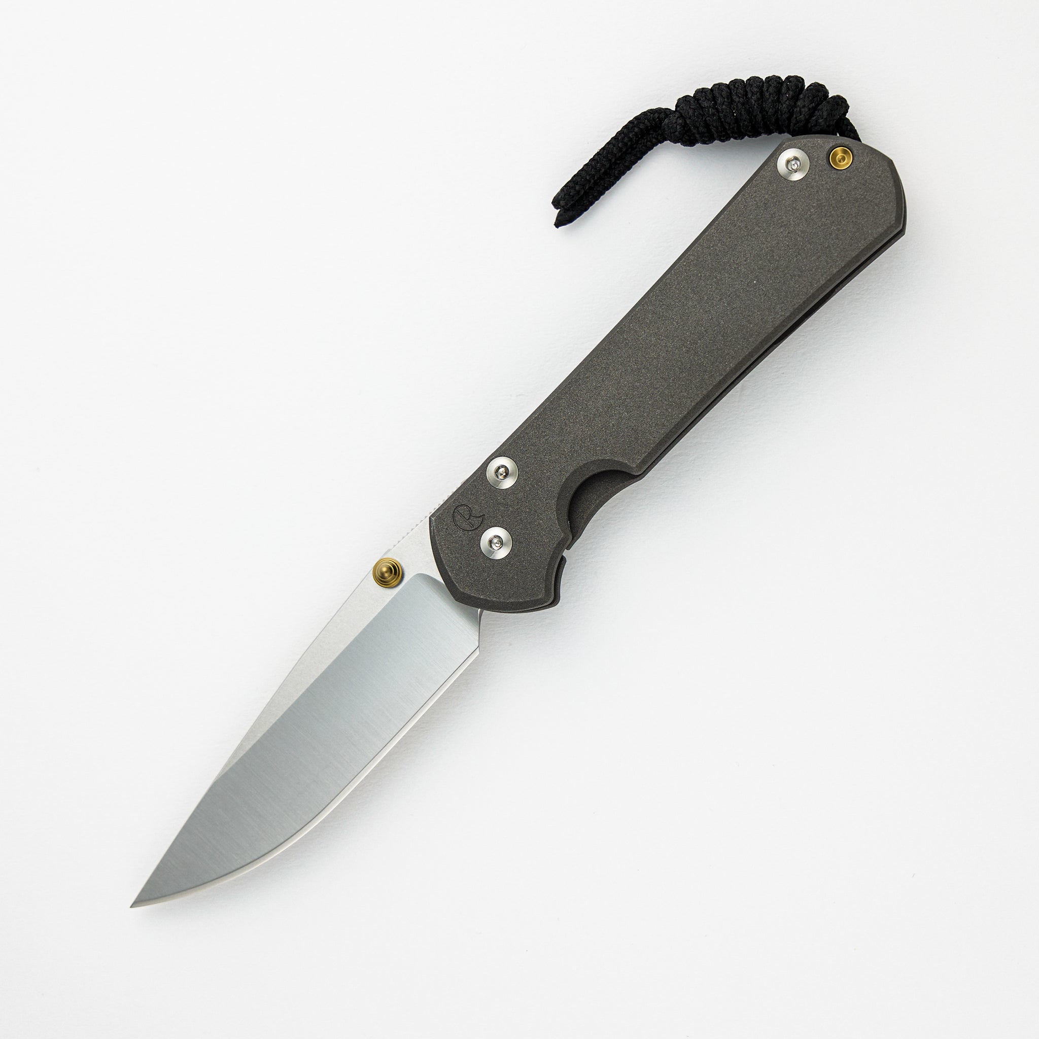 SMALL SEBENZA 31 – POLISHED CPM MAGNACUT BLADE – GOLD DOUBLE THUMB LUGS