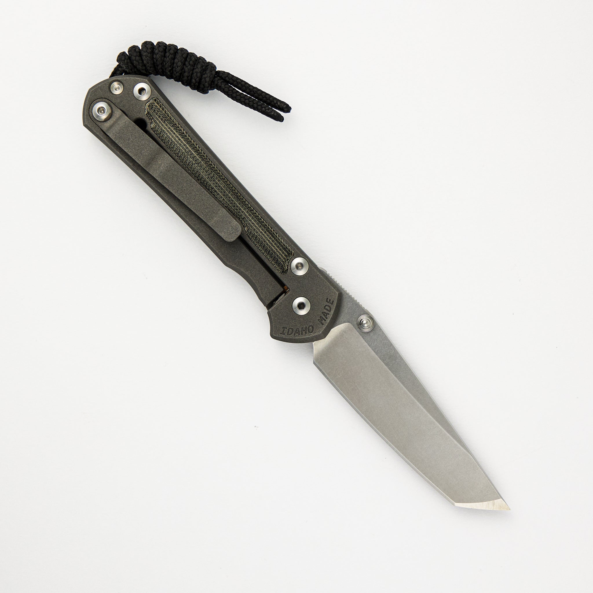 SMALL SEBENZA 31 BLACK CANVAS MICARTA INLAY – CPM MAGNACUT TANTO BLADE – SILVER DOUBLE THUMB LUGS