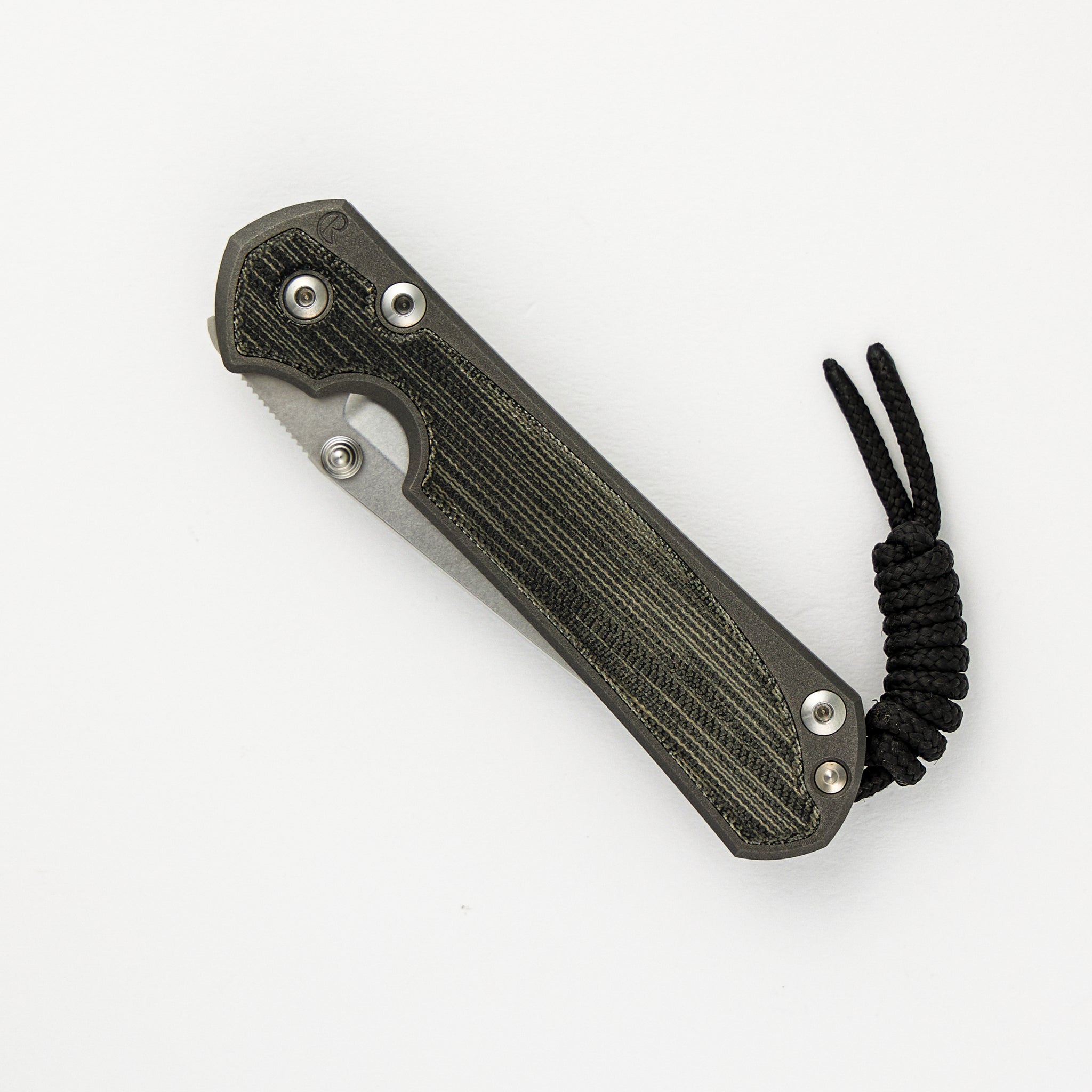 SMALL SEBENZA 31 BLACK CANVAS MICARTA INLAY – CPM MAGNACUT TANTO BLADE – SILVER DOUBLE THUMB LUGS