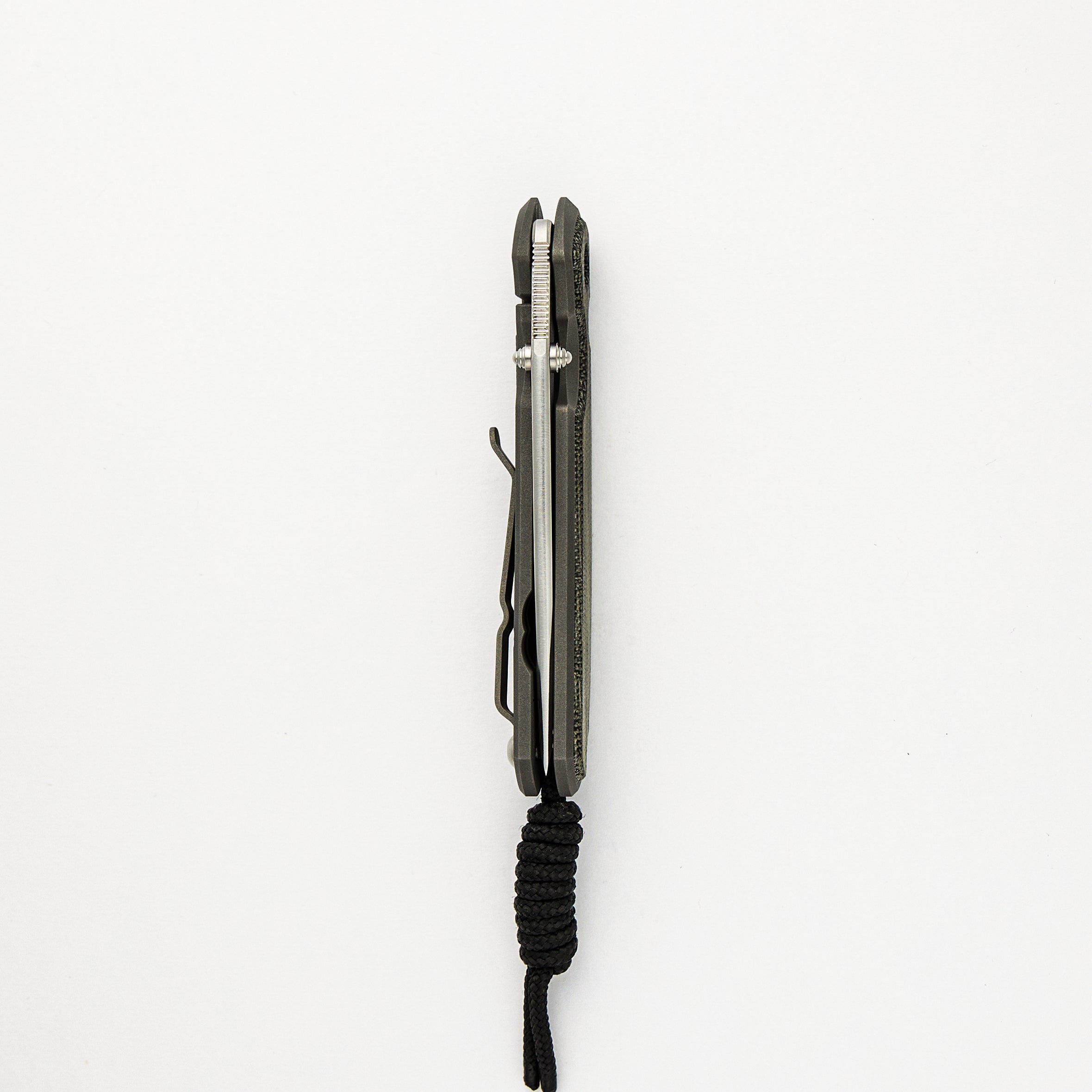 SMALL SEBENZA 31 BLACK CANVAS MICARTA INLAY – CPM MAGNACUT TANTO BLADE – SILVER DOUBLE THUMB LUGS