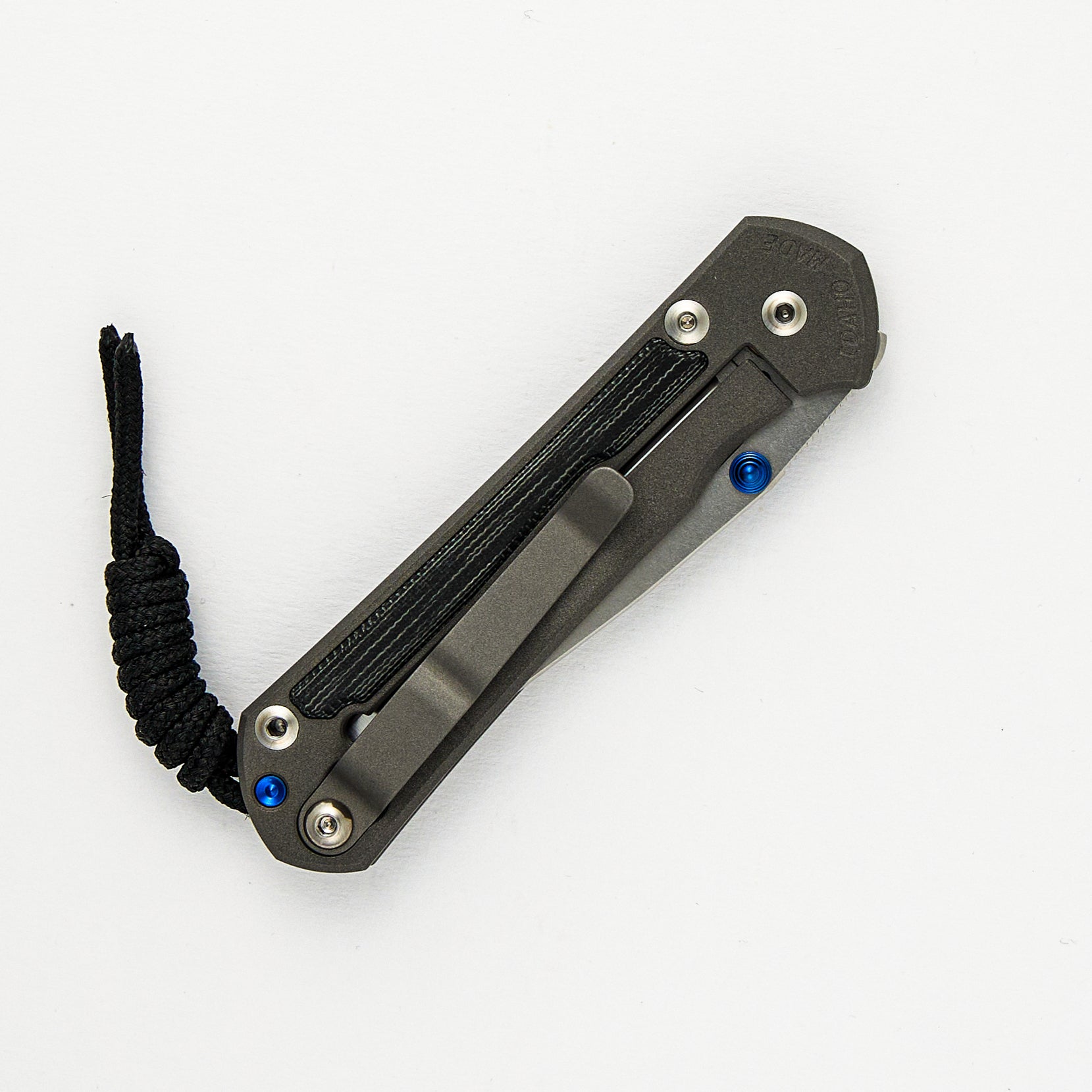 SMALL SEBENZA 31 BLACK CANVAS MICARTA INLAY – POLISHED CPM MAGNACUT BLADE – BLUE DOUBLE THUMB LUGS