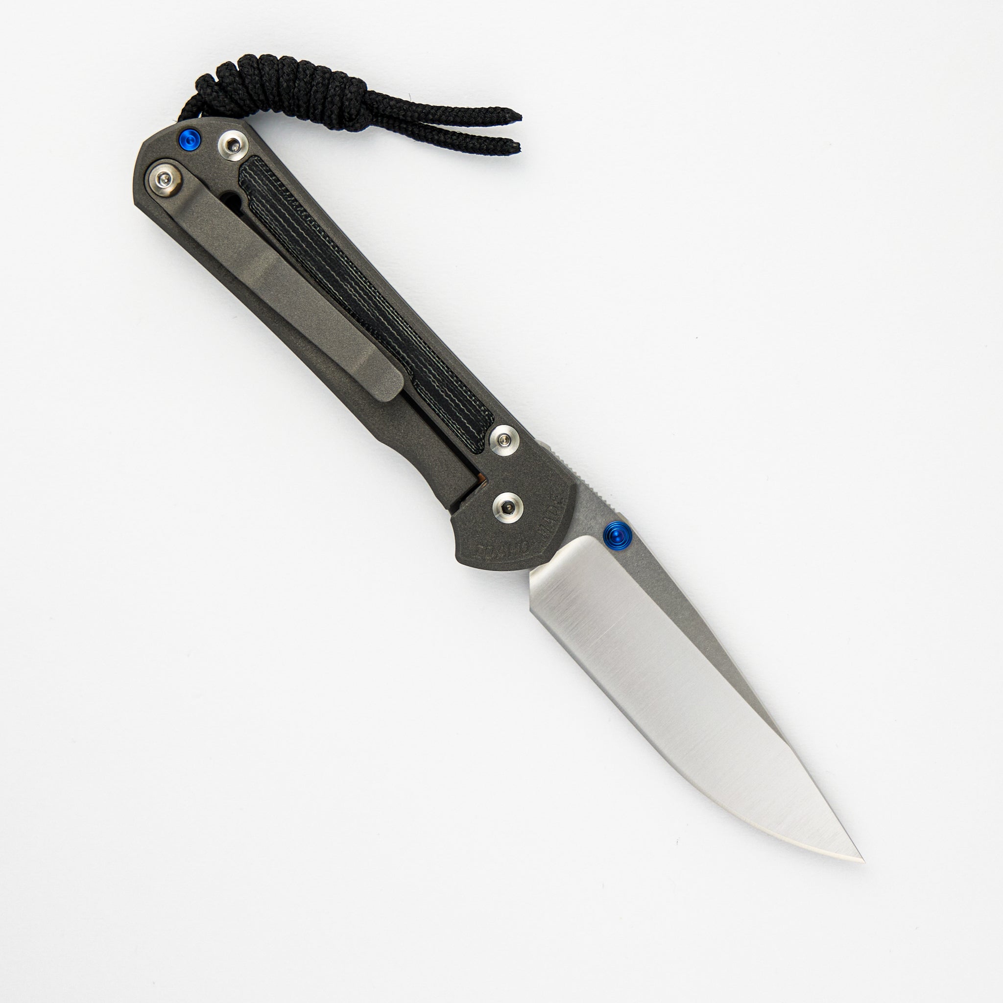 SMALL SEBENZA 31 BLACK CANVAS MICARTA INLAY – POLISHED CPM MAGNACUT BLADE – BLUE DOUBLE THUMB LUGS