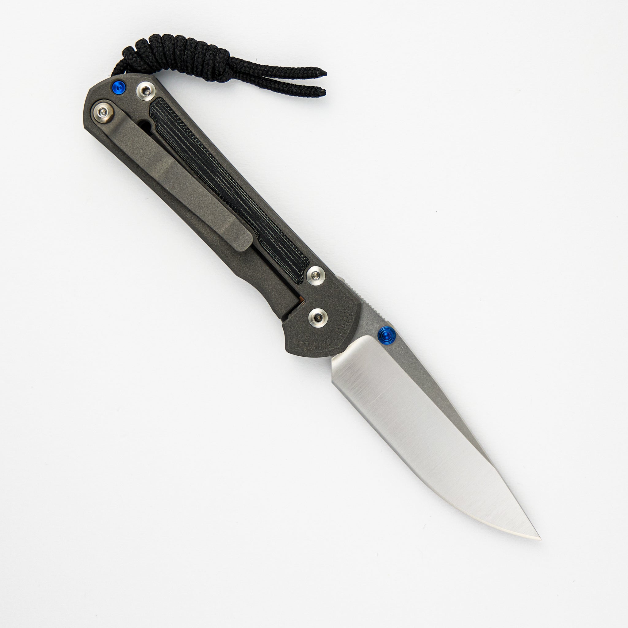 CHRIS REEVE SMALL SEBENZA 31 BLACK CANVAS MICARTA INLAY – POLISHED CPM MAGNACUT BLADE – BLUE DOUBLE THUMB LUGS