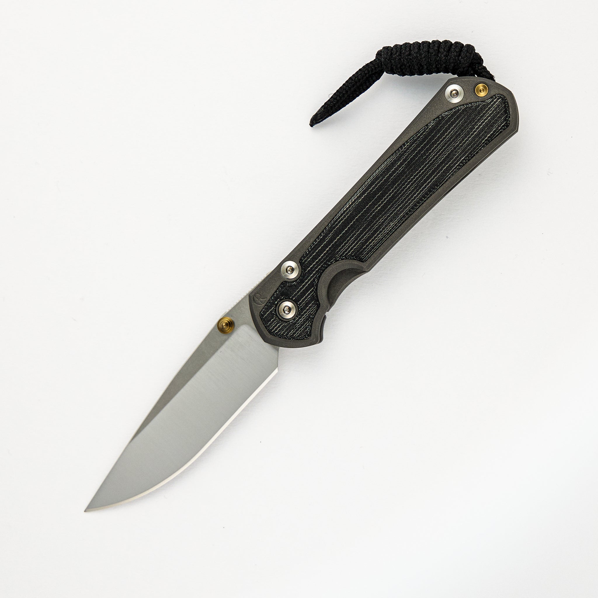 SMALL SEBENZA 31 BLACK CANVAS MICARTA INLAY – POLISHED CPM MAGNACUT BLADE – GOLD DOUBLE THUMB LUGS