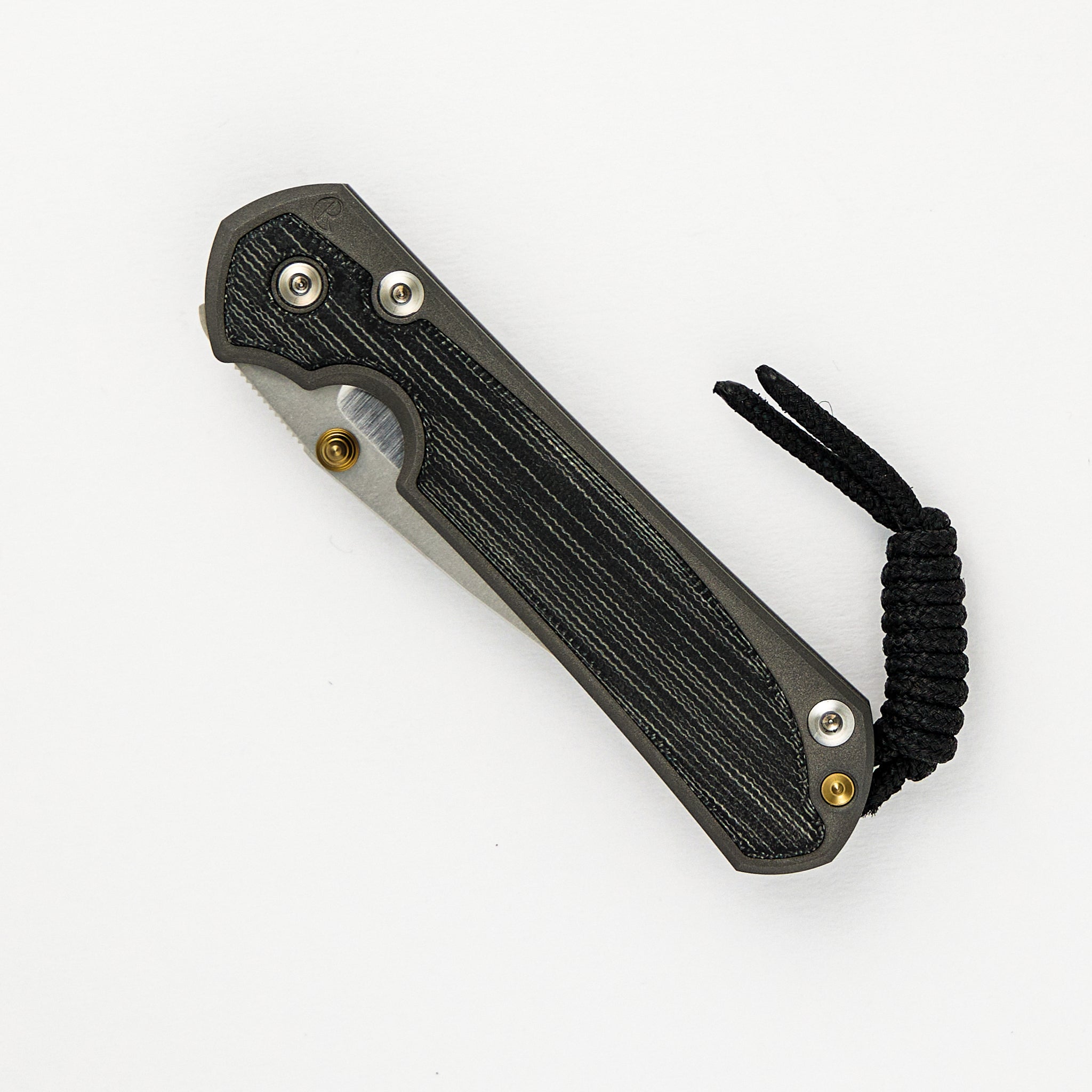 SMALL SEBENZA 31 BLACK CANVAS MICARTA INLAY – POLISHED CPM MAGNACUT BLADE – GOLD DOUBLE THUMB LUGS