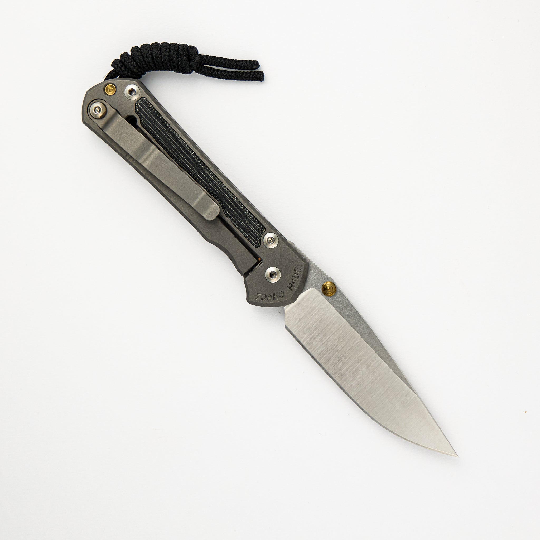 SMALL SEBENZA 31 BLACK CANVAS MICARTA INLAY – POLISHED CPM MAGNACUT BLADE – GLASS BLASTED – GOLD DOUBLE THUMB LUGS