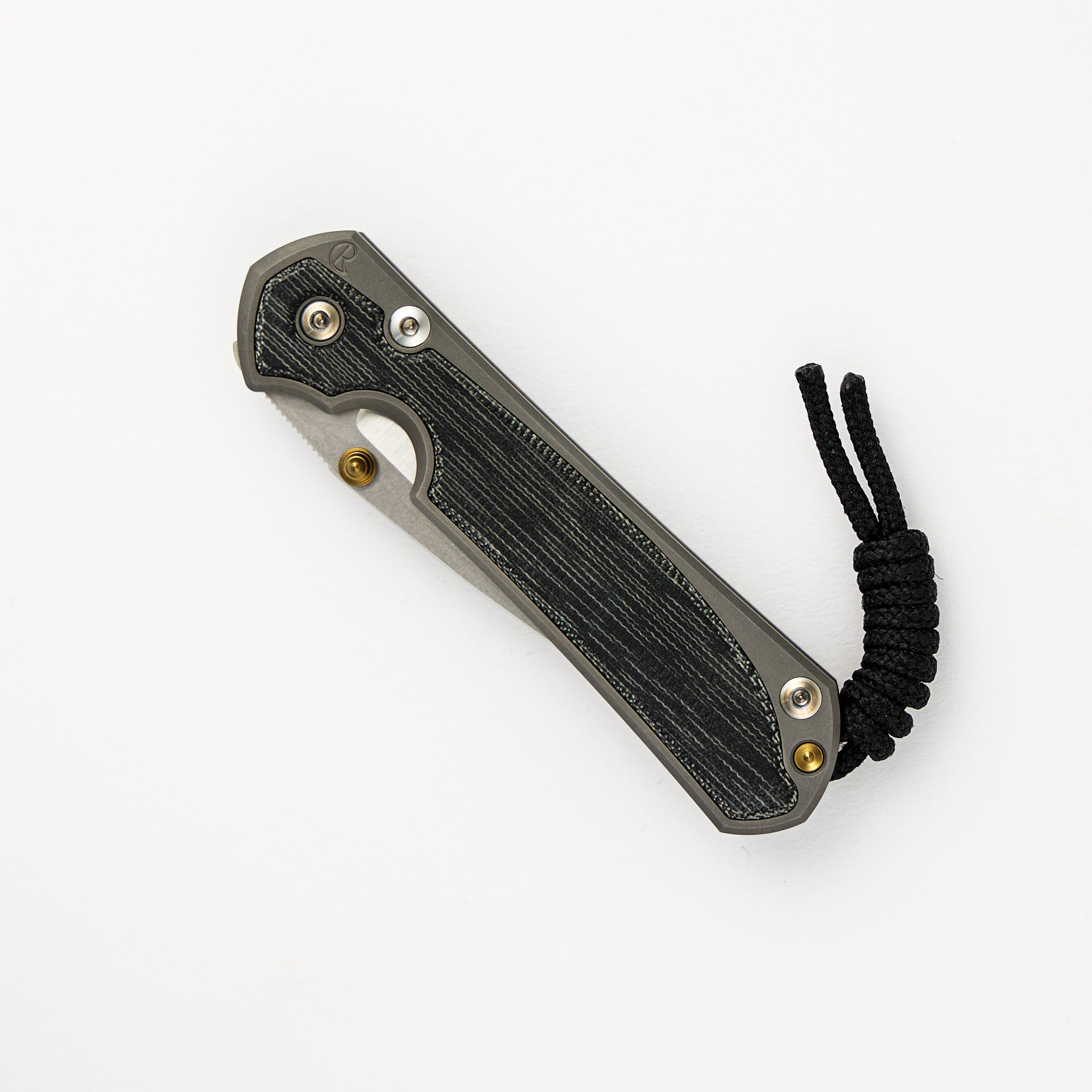 SMALL SEBENZA 31 BLACK CANVAS MICARTA INLAY – POLISHED CPM MAGNACUT BLADE – GLASS BLASTED – GOLD DOUBLE THUMB LUGS