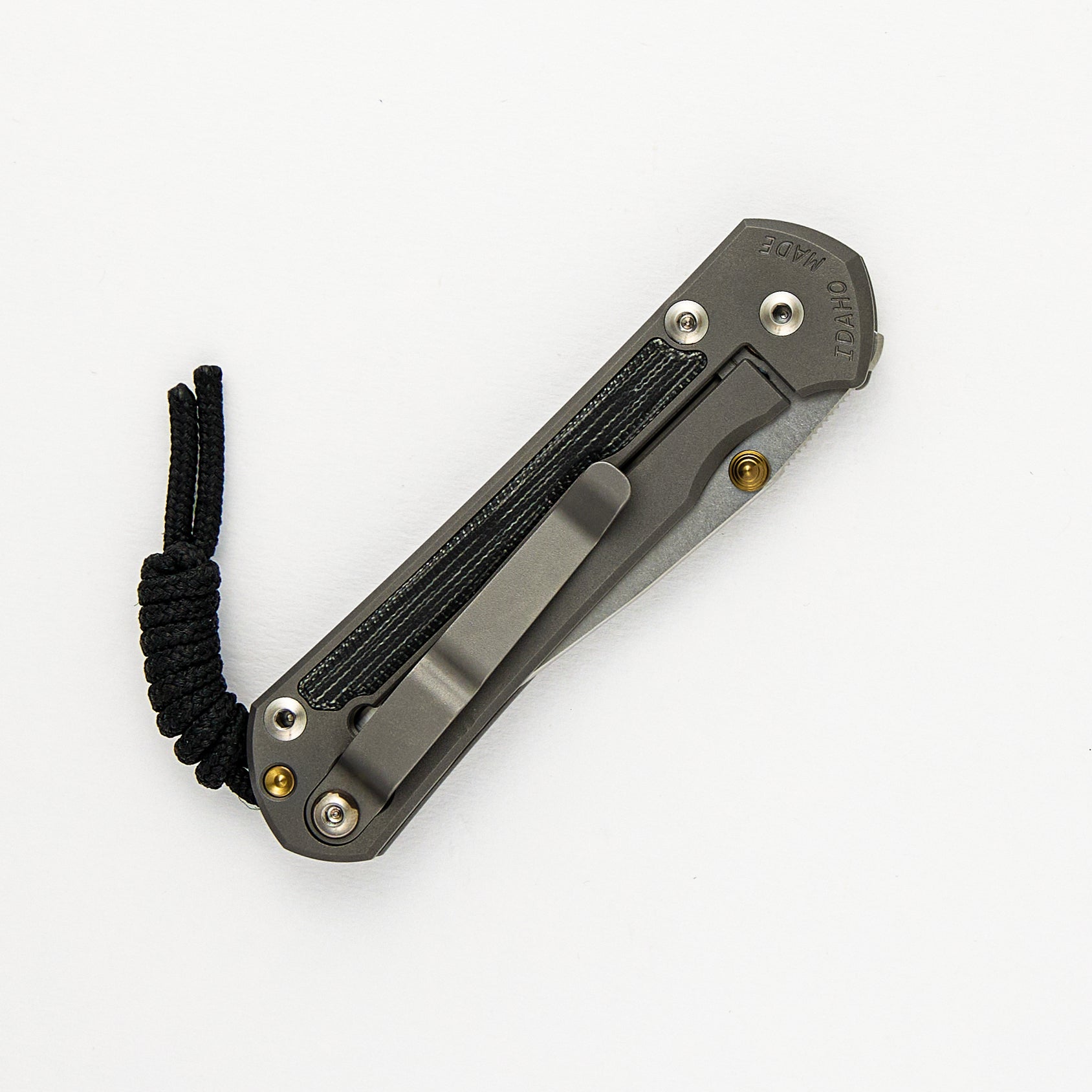 SMALL SEBENZA 31 BLACK CANVAS MICARTA INLAY – POLISHED CPM MAGNACUT BLADE – GLASS BLASTED – GOLD DOUBLE THUMB LUGS