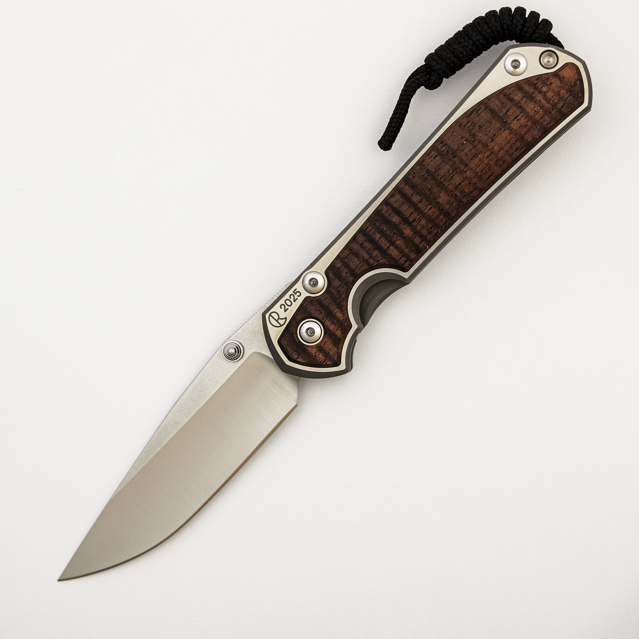 Large Sebenza 31 Annual 2025 - Koa Inlay - Polished Drop Point CPM MagnaCut Blade - Silver Single Thumb Lug
