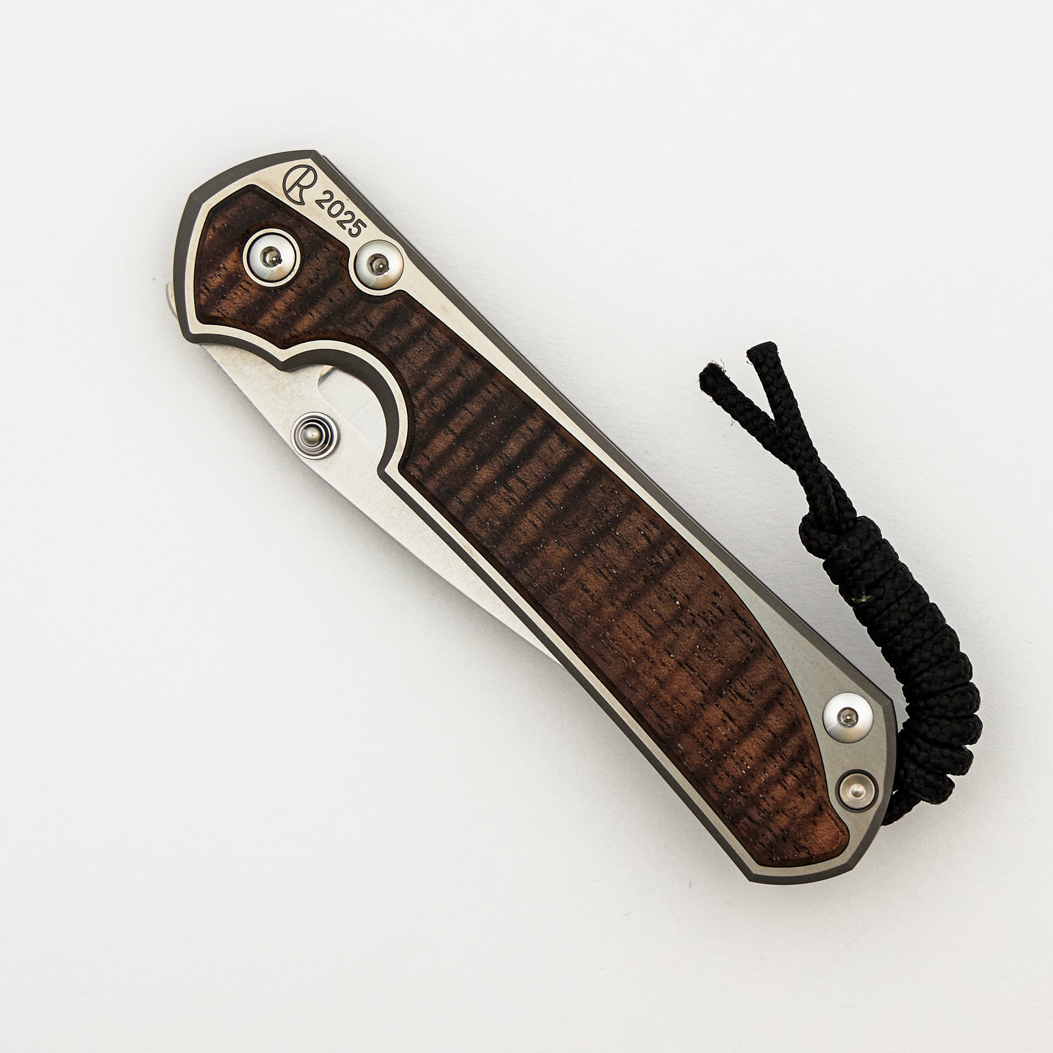 Large Sebenza 31 Annual 2025 - Koa Inlay - Polished Drop Point CPM MagnaCut Blade - Silver Single Thumb Lug