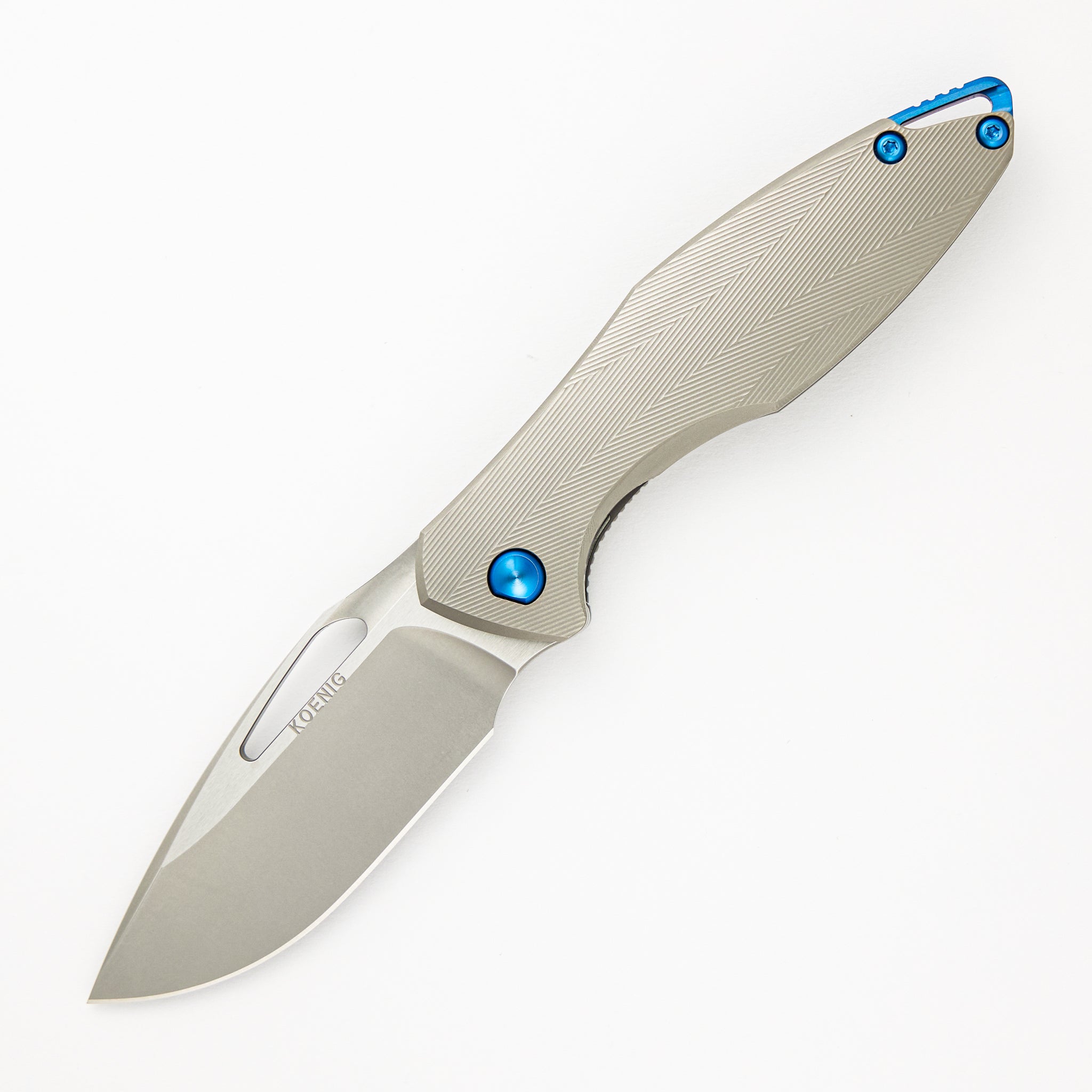 Arius - Non Flipper - Patterned Titanium Handle - M390 Blade