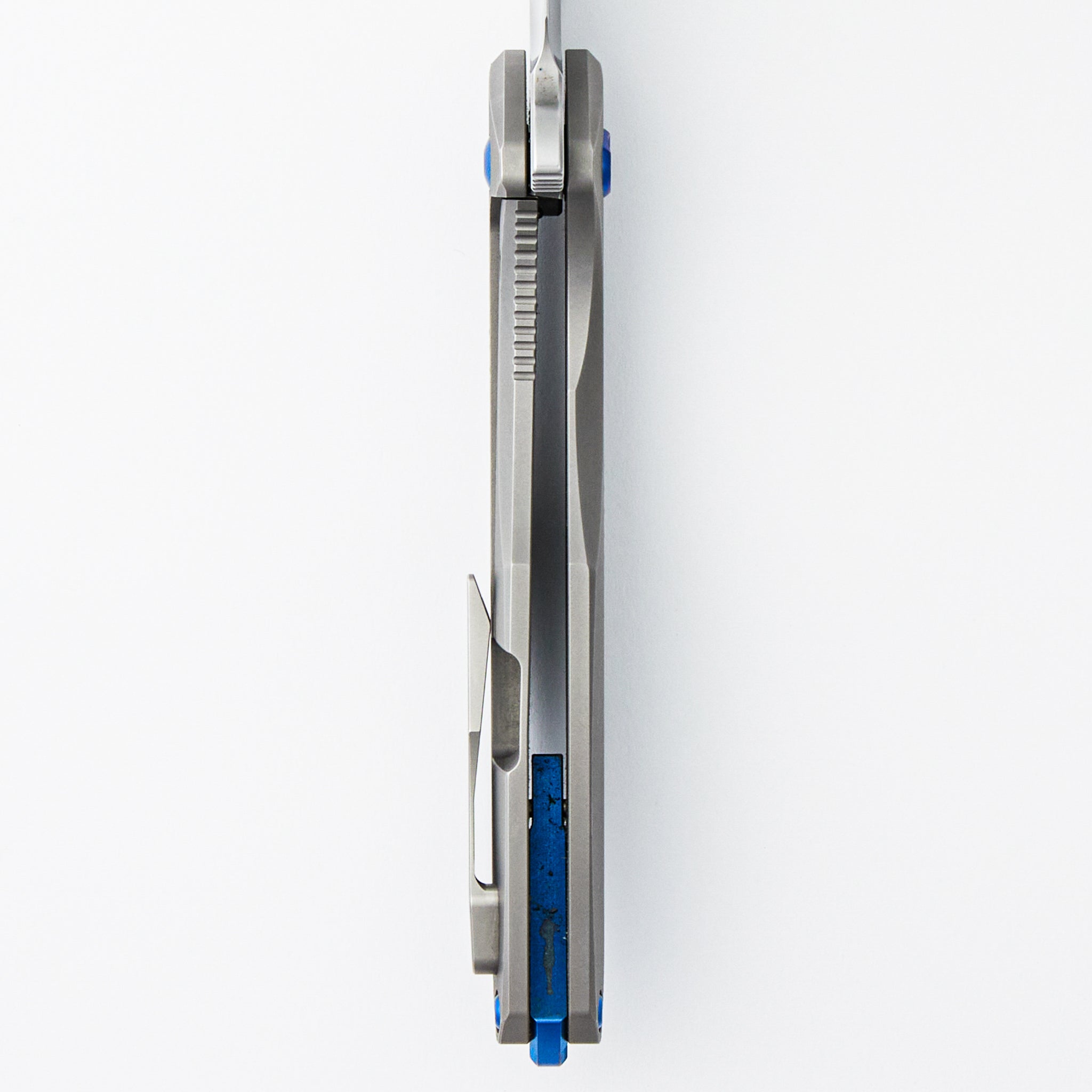 Arius - Patterned Titanium Handle - Blue Hardware - Burnished w/ Polished Flats M390 Blade