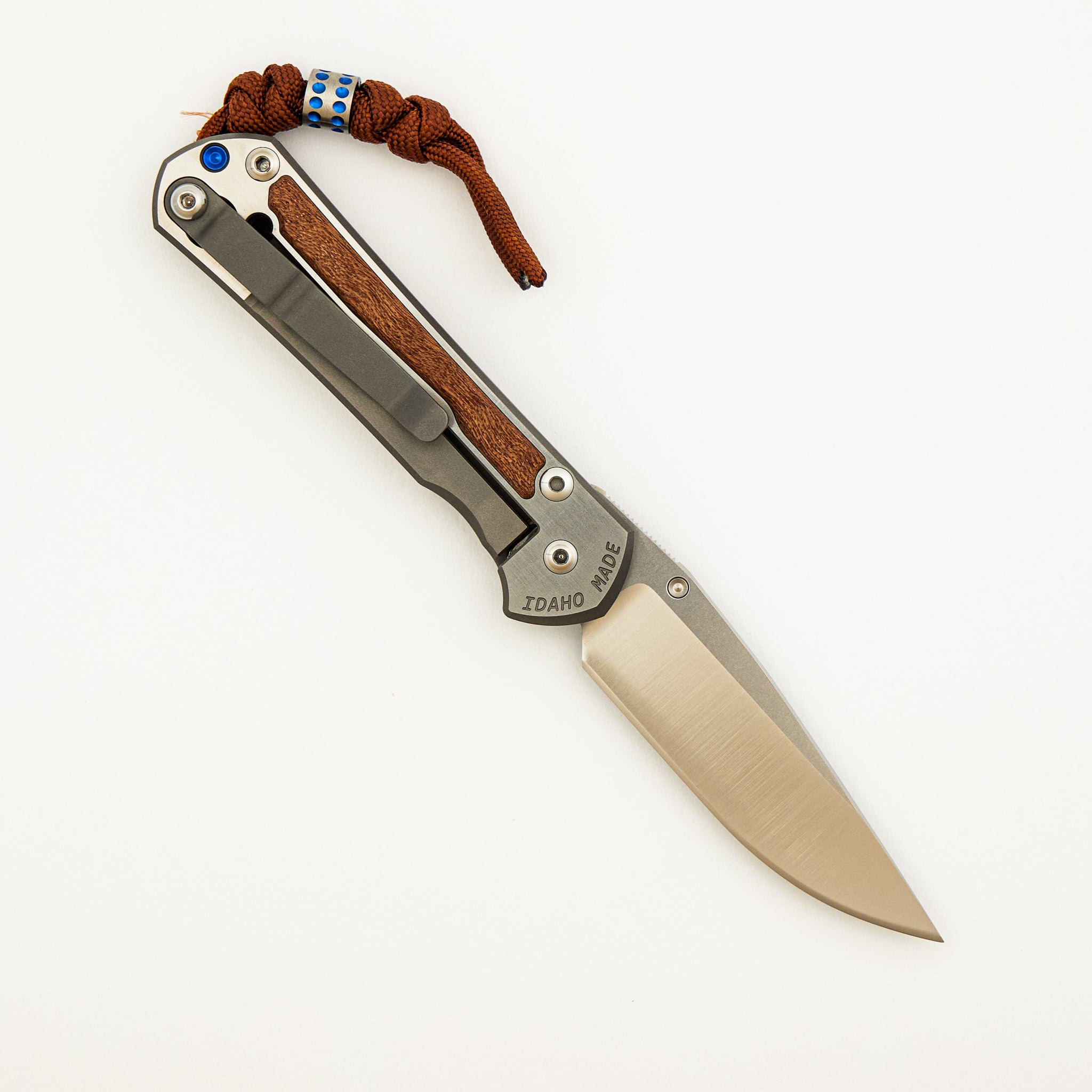 Small Sebenza 31 Annual 2023 - Sapele Mahogany Inlay - Polished Drop Point CPM MagnaCut Blade - Silver Single Thumb Lug