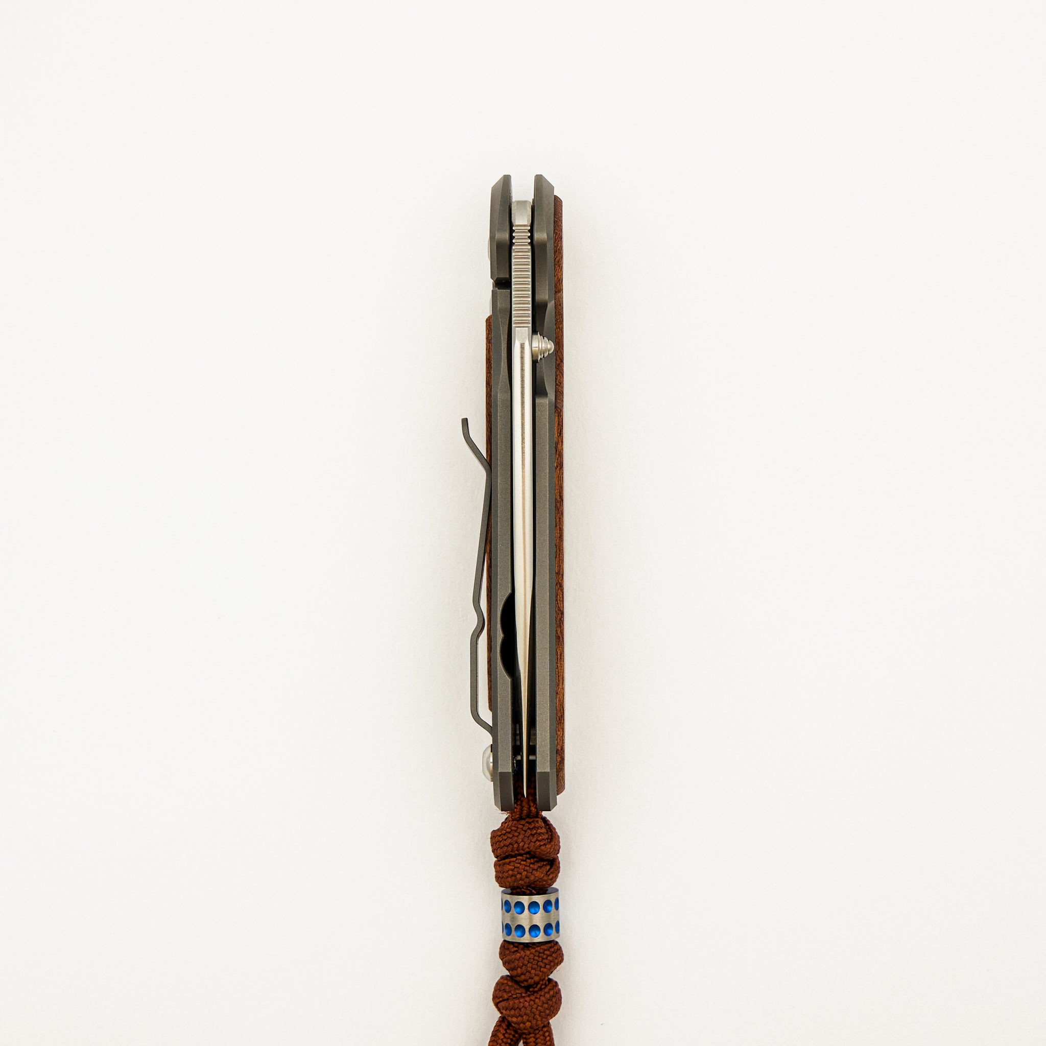 Small Sebenza 31 Annual 2023 - Sapele Mahogany Inlay - Polished Drop Point CPM MagnaCut Blade - Silver Single Thumb Lug
