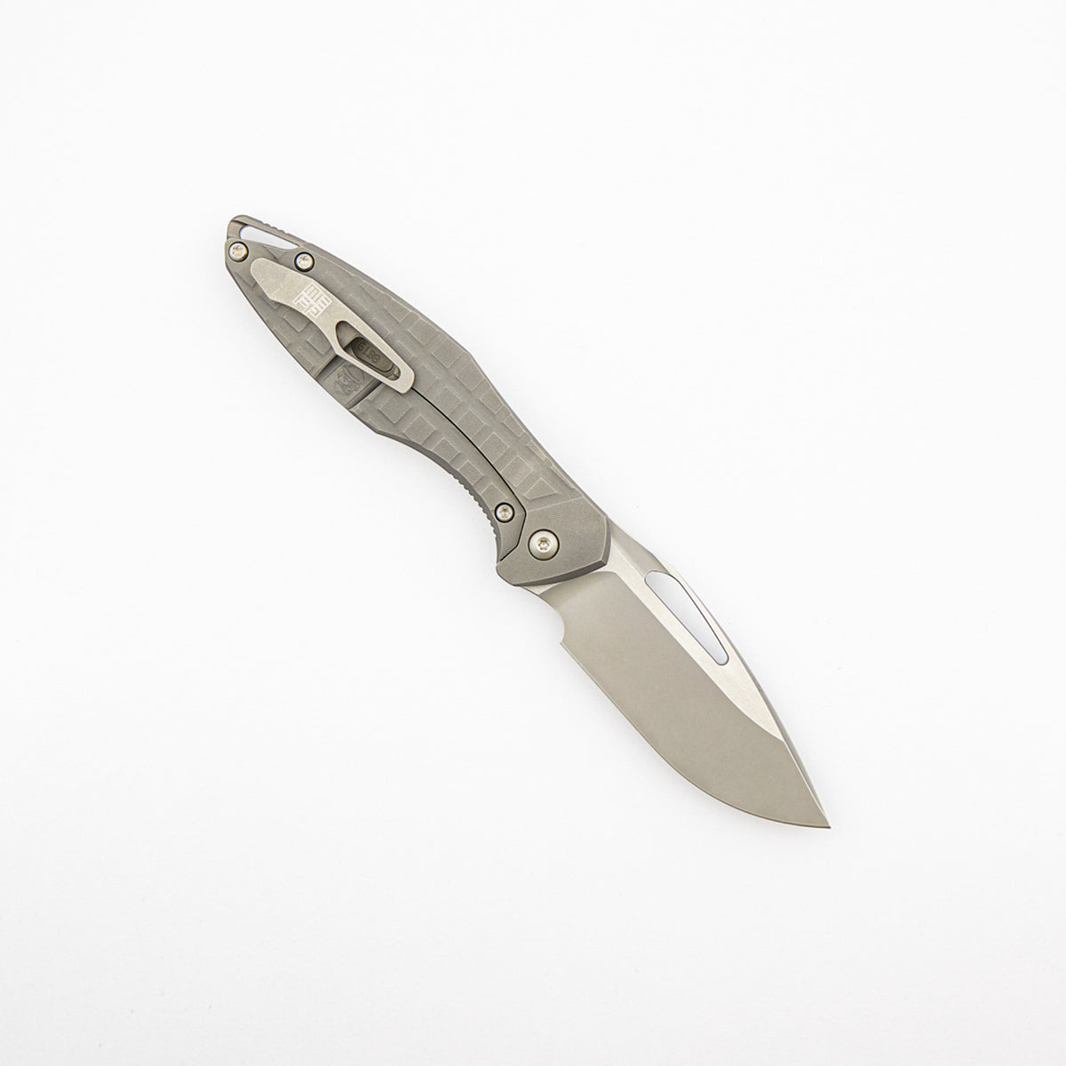 Mini Arius - Non Flipper - Frag Patterned Titanium Handle - Silver Hardware - Burnished W/ Polished Flats M390 Blade