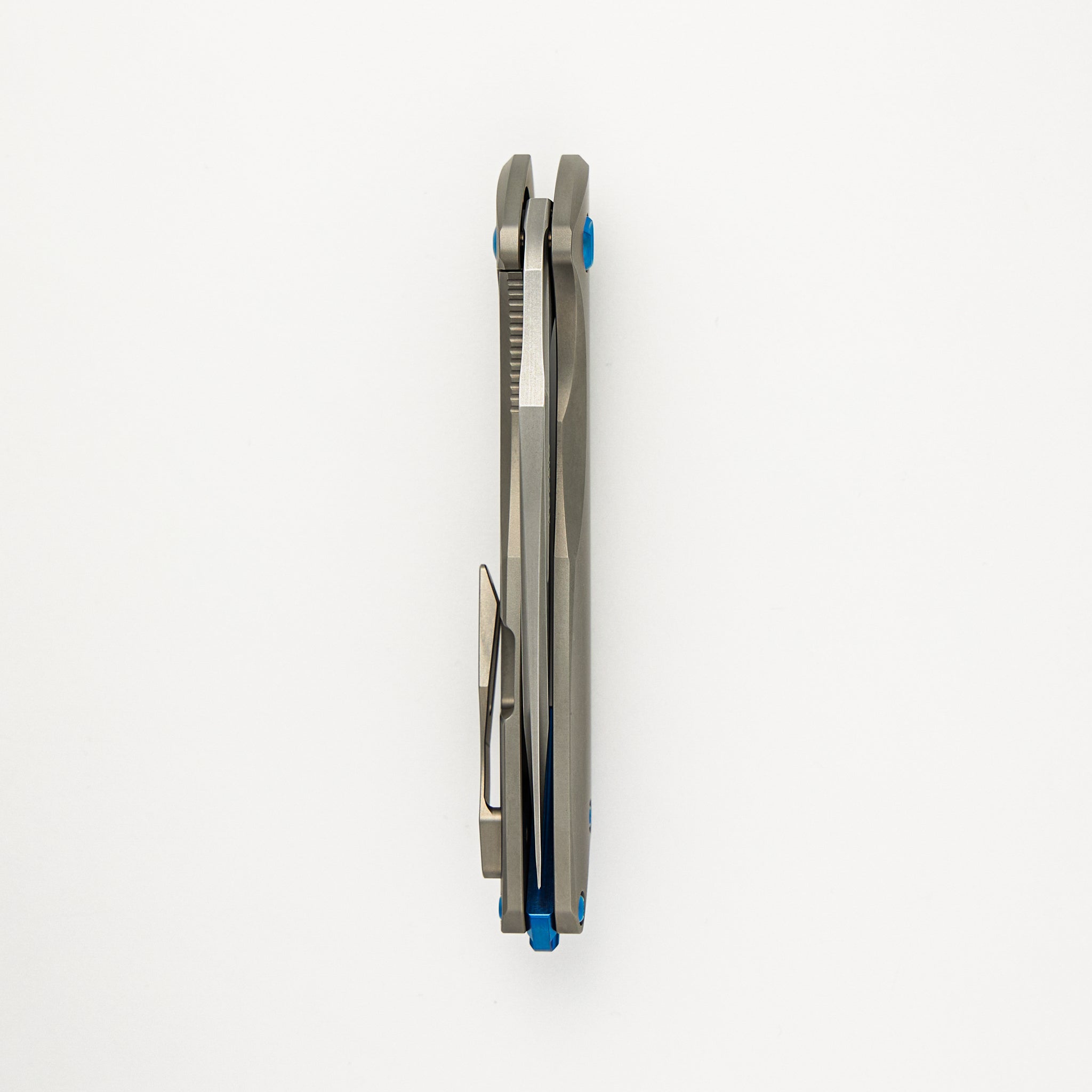Arius - Pinstripe Titanium Handle - Blue Hardware - Burnished W/ Polished Flats M390 Blade
