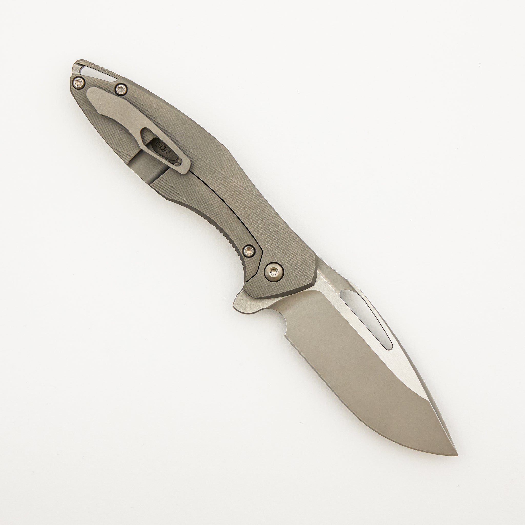 Mini Arius - Patterned Titanium Handle - Silver Hardware - Burnished W/ Polished Flats M390 Blade