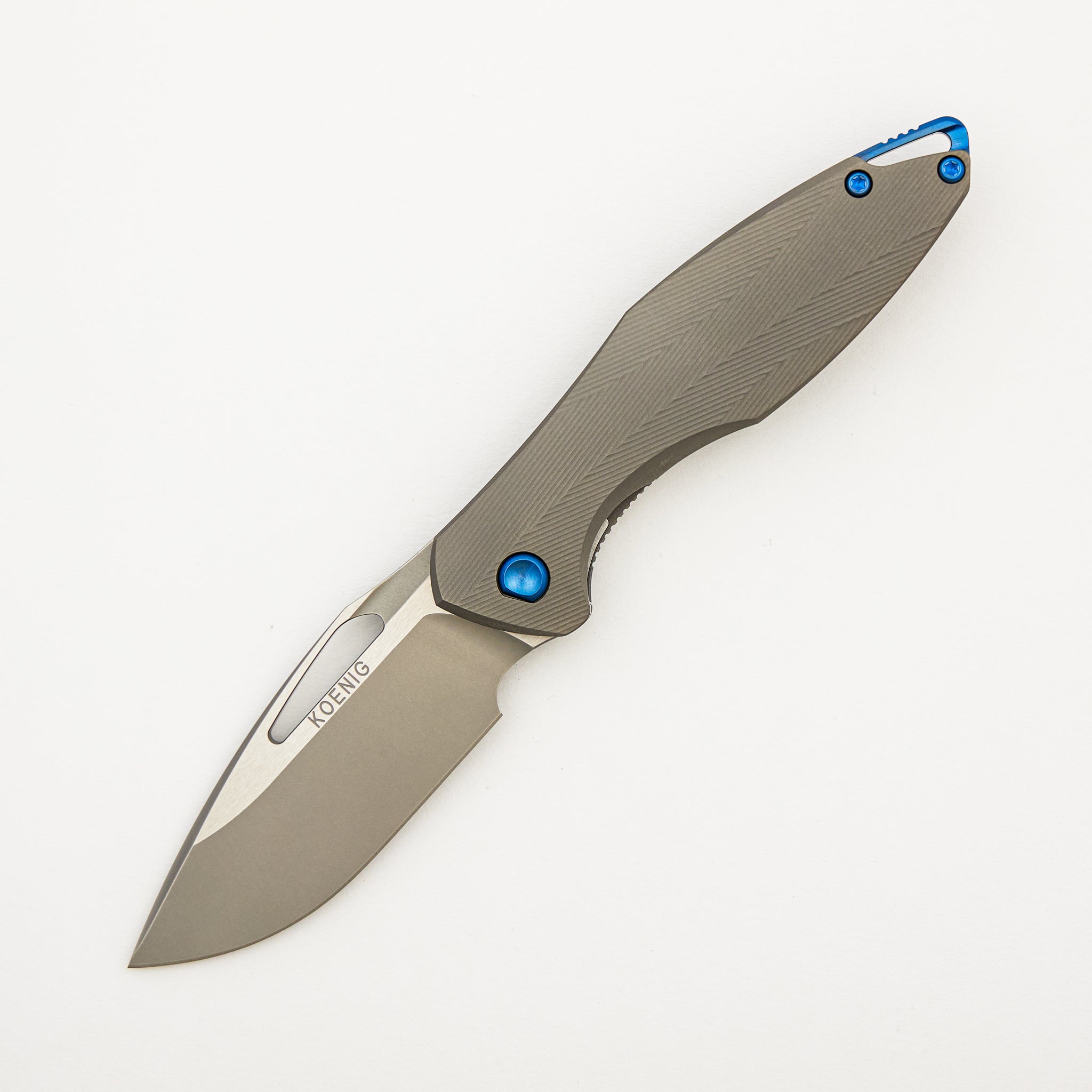 Mini Arius - Non Flipper - Patterned Titanium Handle - Blue Hardware - Burnished W/ Polished Flats M390 Blade
