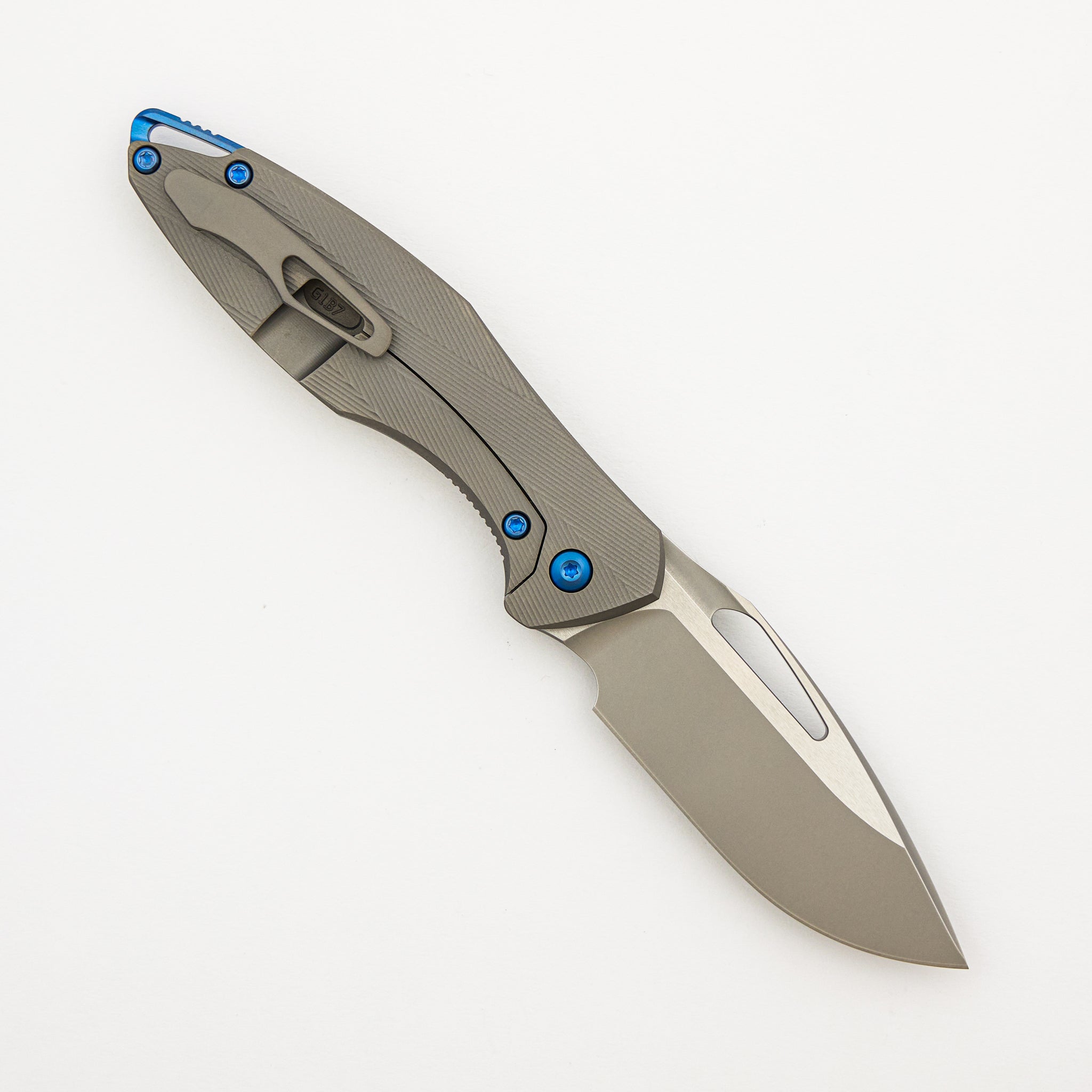 Mini Arius - Non Flipper - Patterned Titanium Handle - Blue Hardware - Burnished W/ Polished Flats M390 Blade