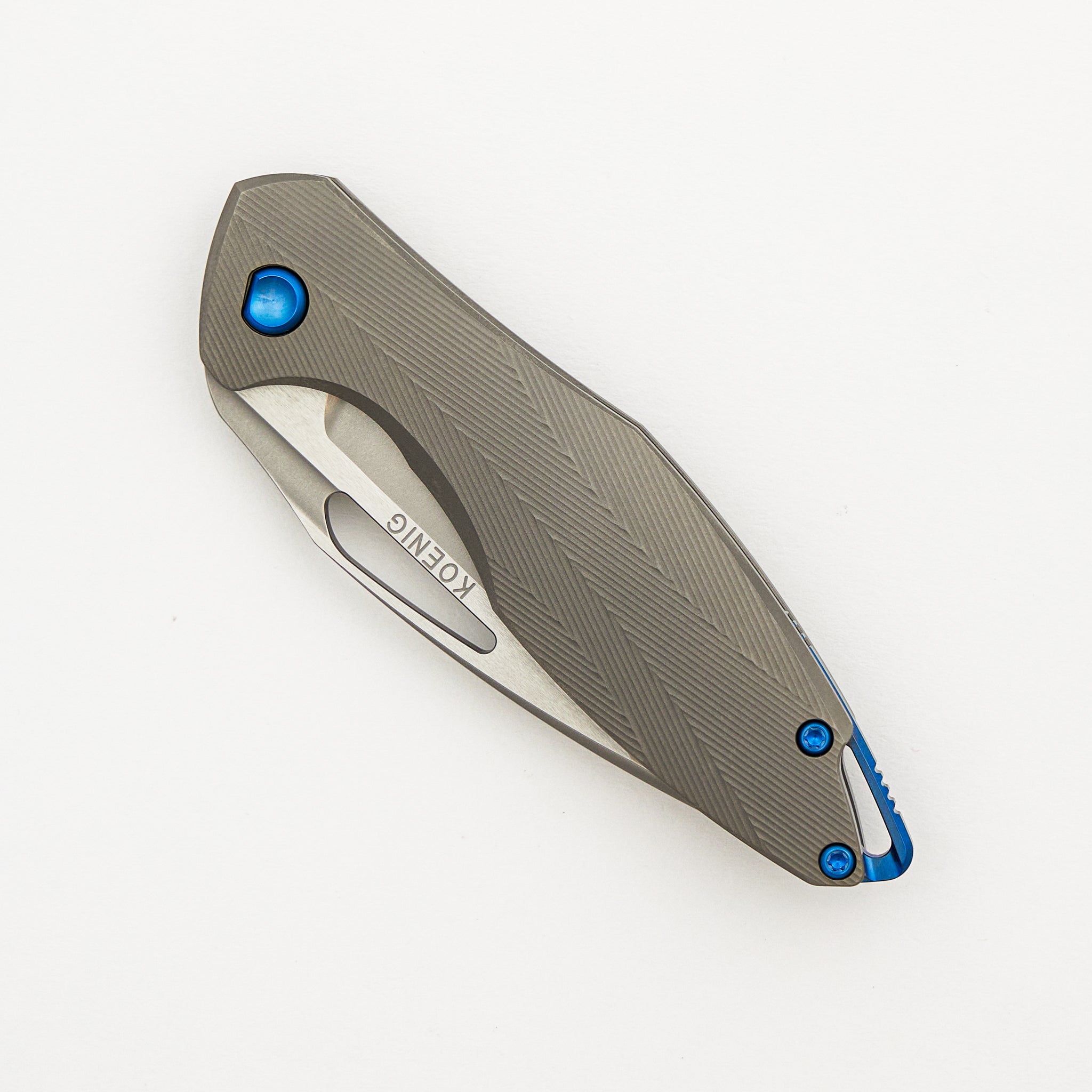 Mini Arius - Non Flipper - Patterned Titanium Handle - Blue Hardware - Burnished W/ Polished Flats M390 Blade