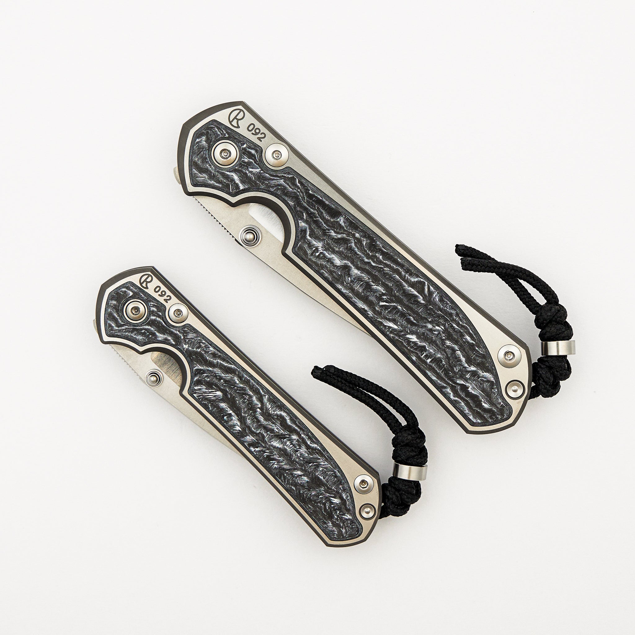 Large & Small Sebenza 31 Numbered Matched Set - White CarboTi Inlay - Polished Drop Point CPM MagnaCut Blade - Silver Double Lugs