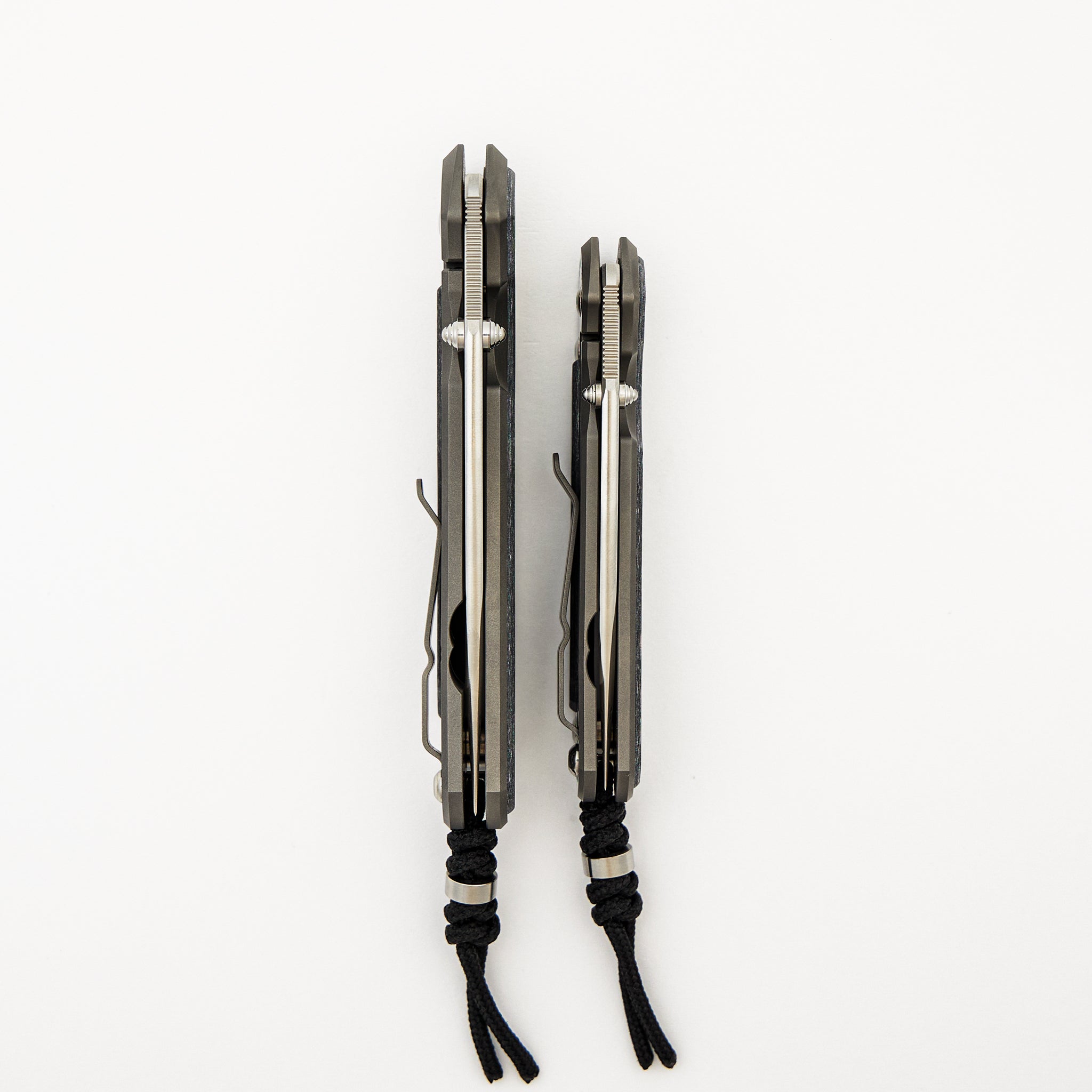 Large & Small Sebenza 31 Numbered Matched Set - White CarboTi Inlay - Polished Drop Point CPM MagnaCut Blade - Silver Double Lugs