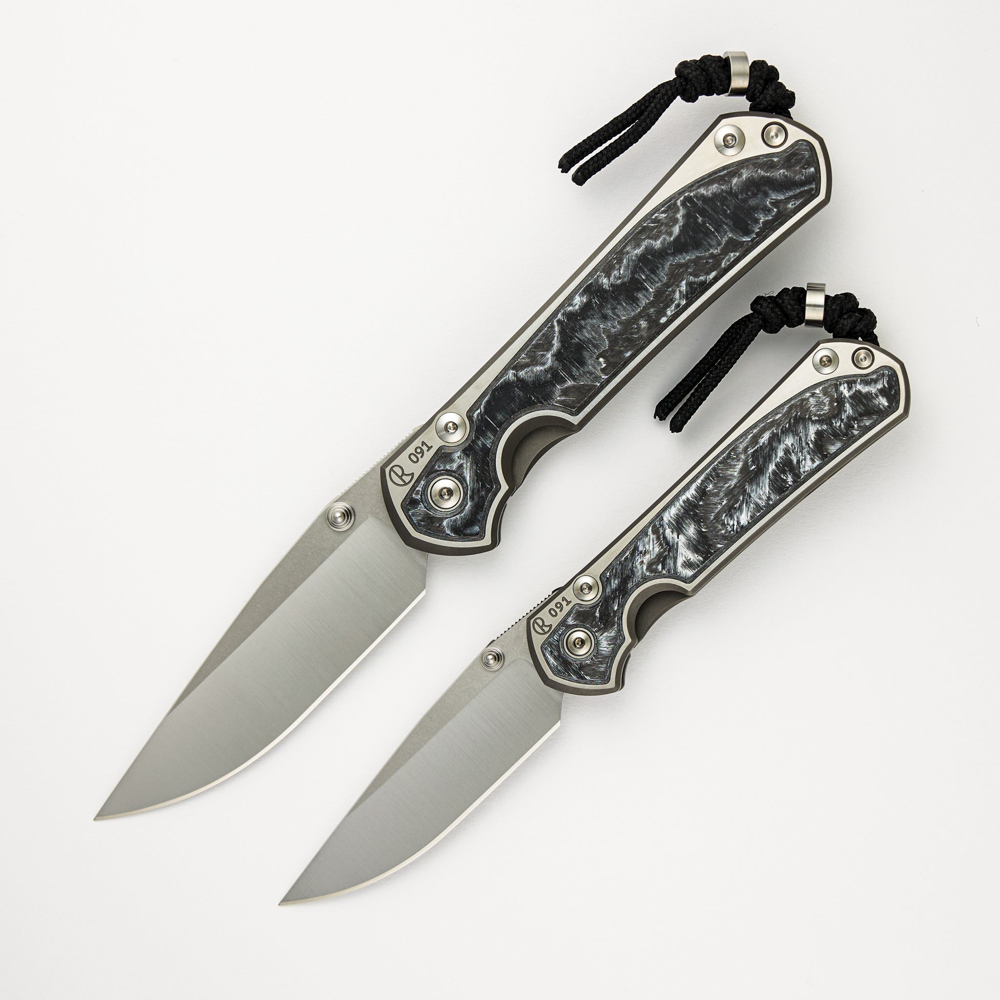 Large & Small Sebenza 31 Numbered Matched Set - White CarboTi Inlay - Polished Drop Point CPM MagnaCut Blade - Silver Double Lugs