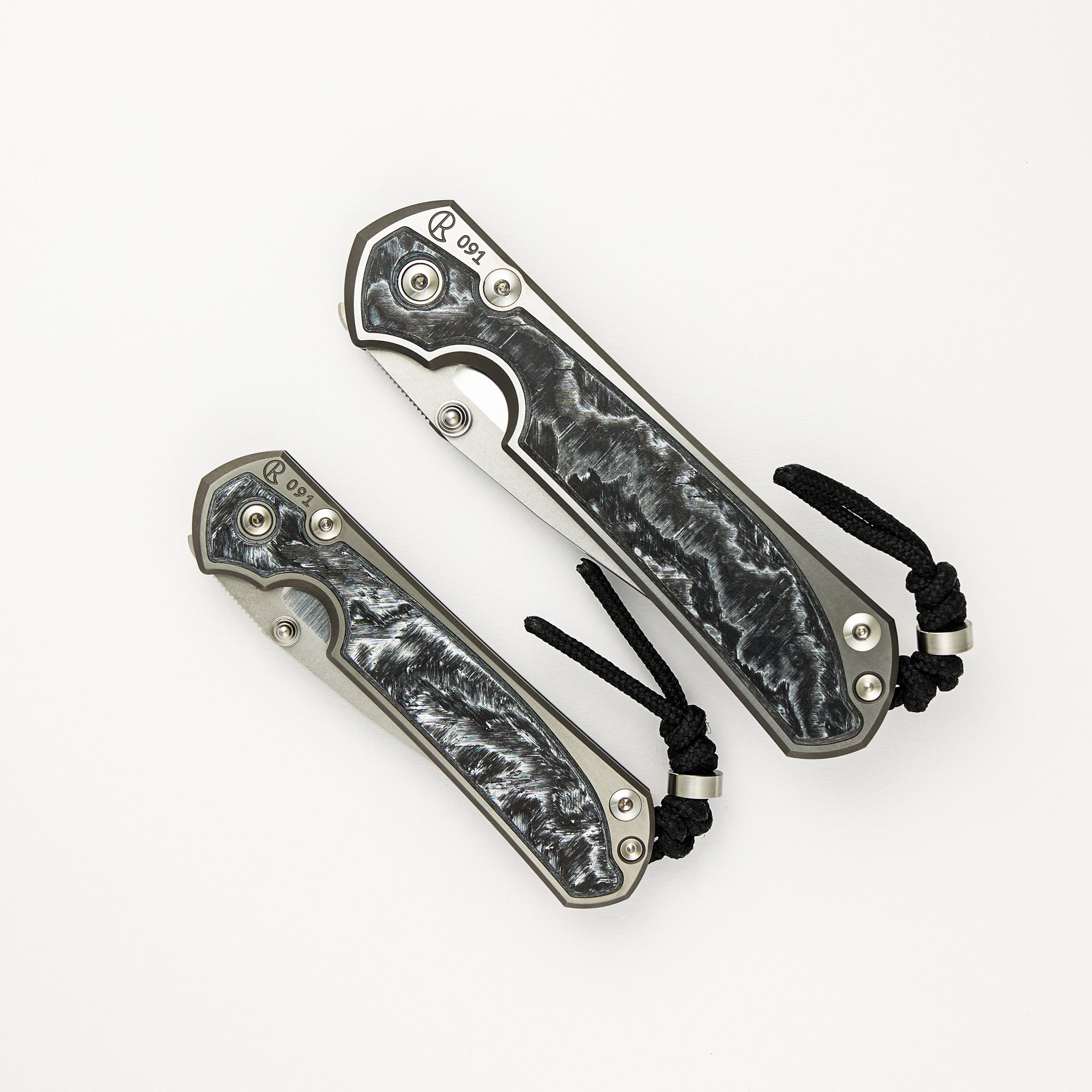 Large & Small Sebenza 31 Numbered Matched Set - White CarboTi Inlay - Polished Drop Point CPM MagnaCut Blade - Silver Double Lugs