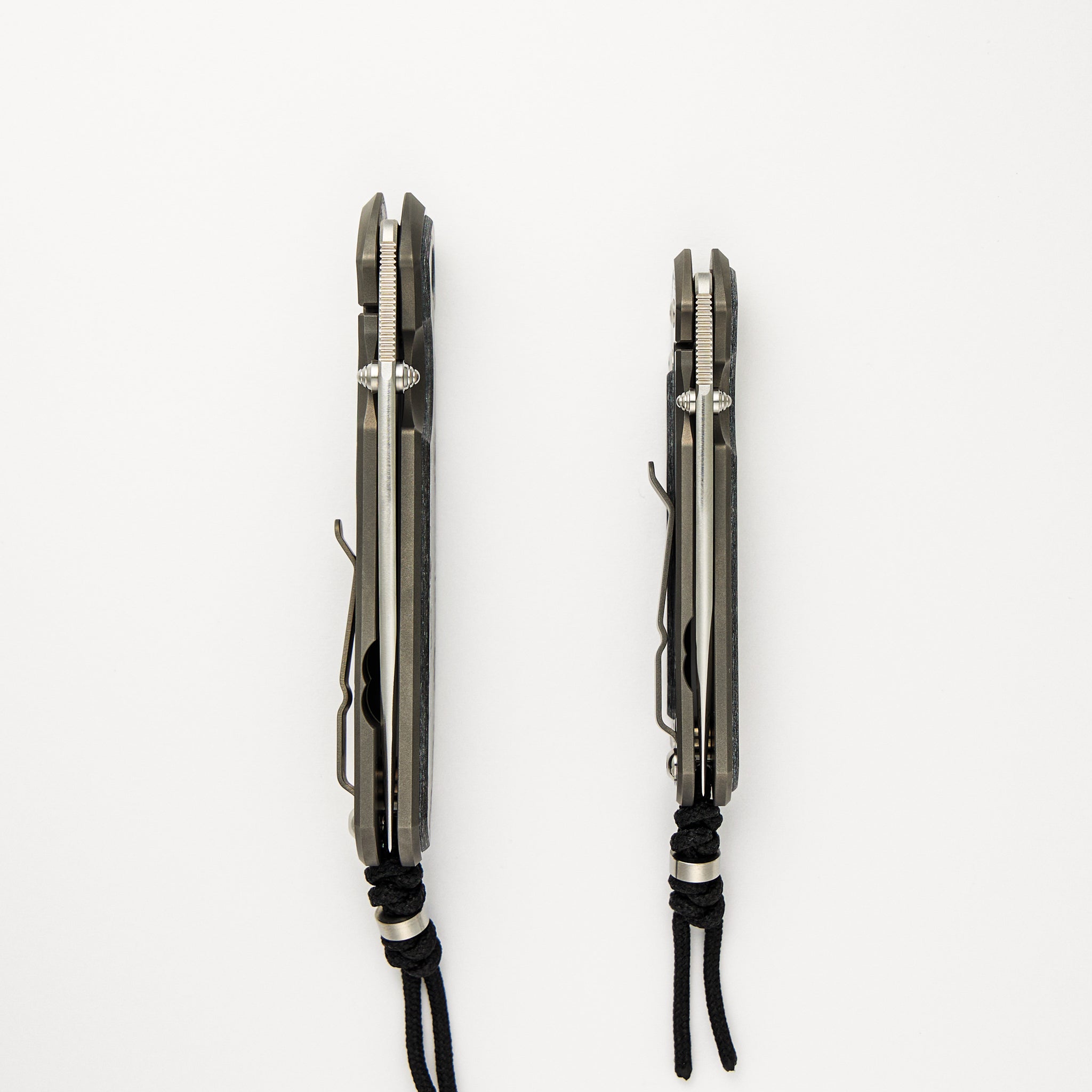 Large & Small Sebenza 31 Numbered Matched Set - White CarboTi Inlay - Polished Drop Point CPM MagnaCut Blade - Silver Double Lugs