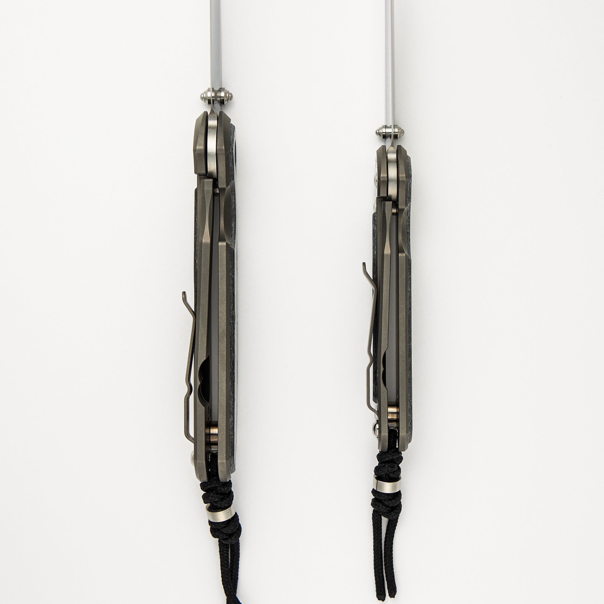 Large & Small Sebenza 31 Numbered Matched Set - White CarboTi Inlay - Polished Drop Point CPM MagnaCut Blade - Silver Double Lugs