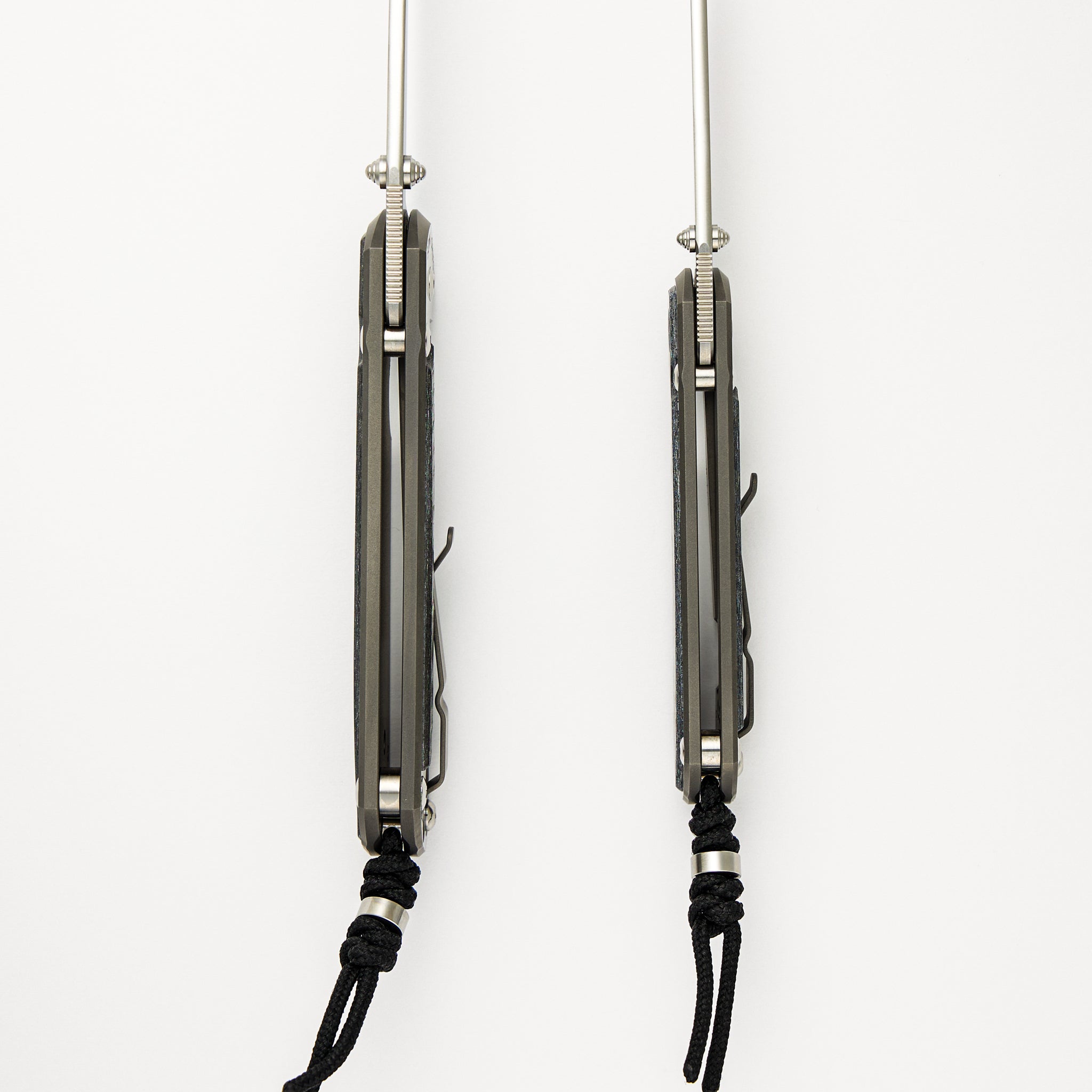 Large & Small Sebenza 31 Numbered Matched Set - White CarboTi Inlay - Polished Drop Point CPM MagnaCut Blade - Silver Double Lugs